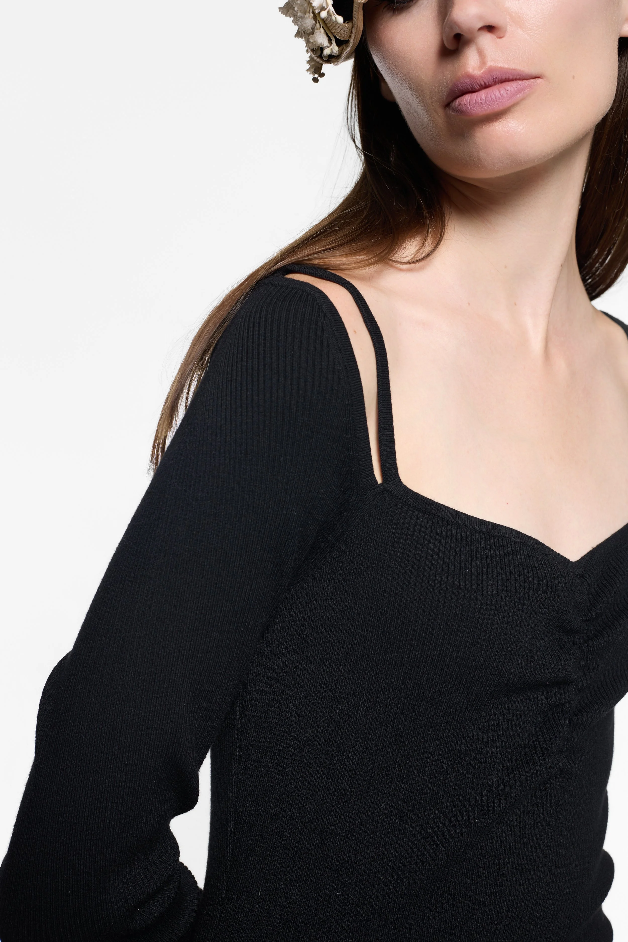 Close-up of square neckline and gathered centre bust on Victor Glemaud dress