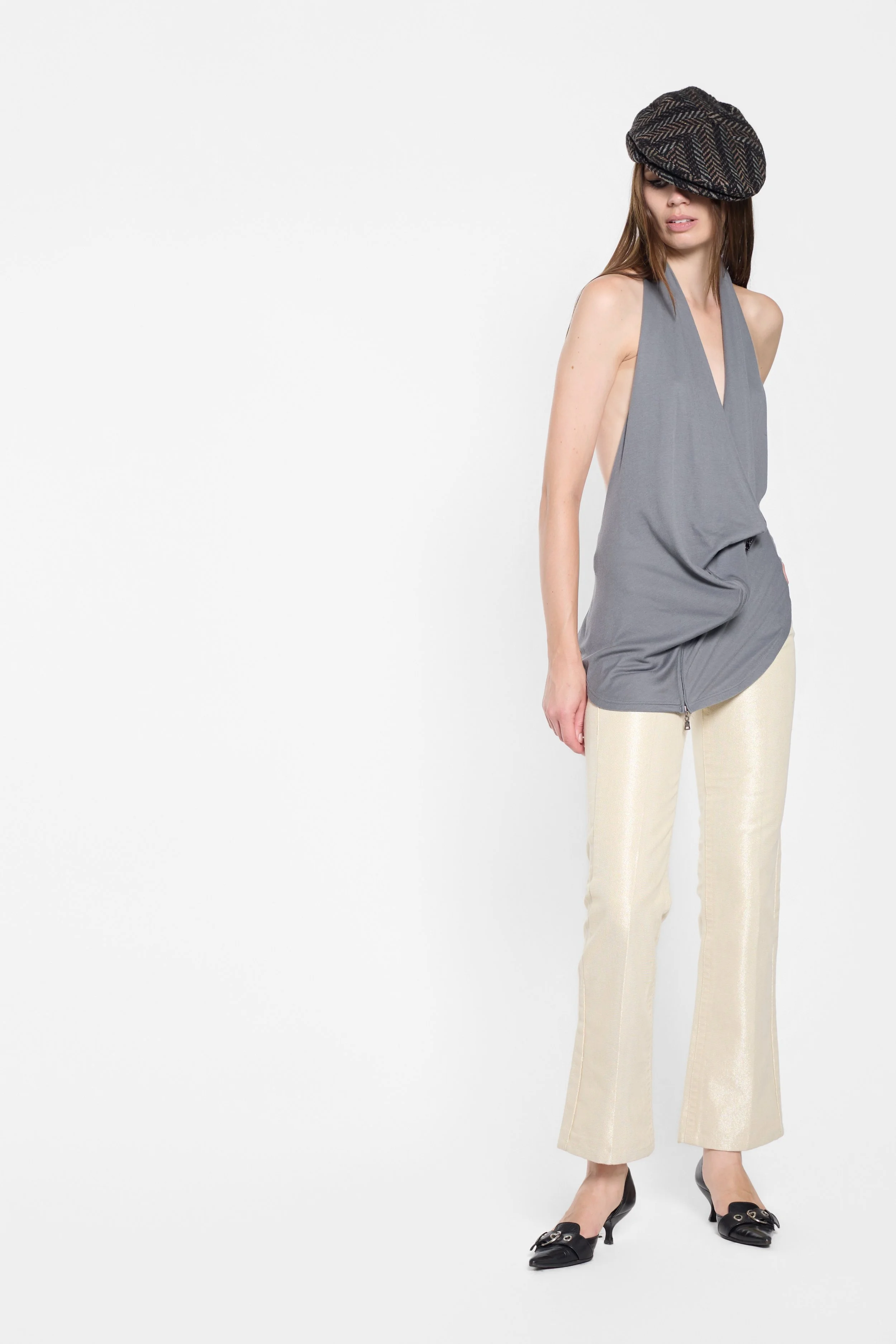 LUXXM grey Japanese designer two-piece top styled with the asymmetric hem visible
