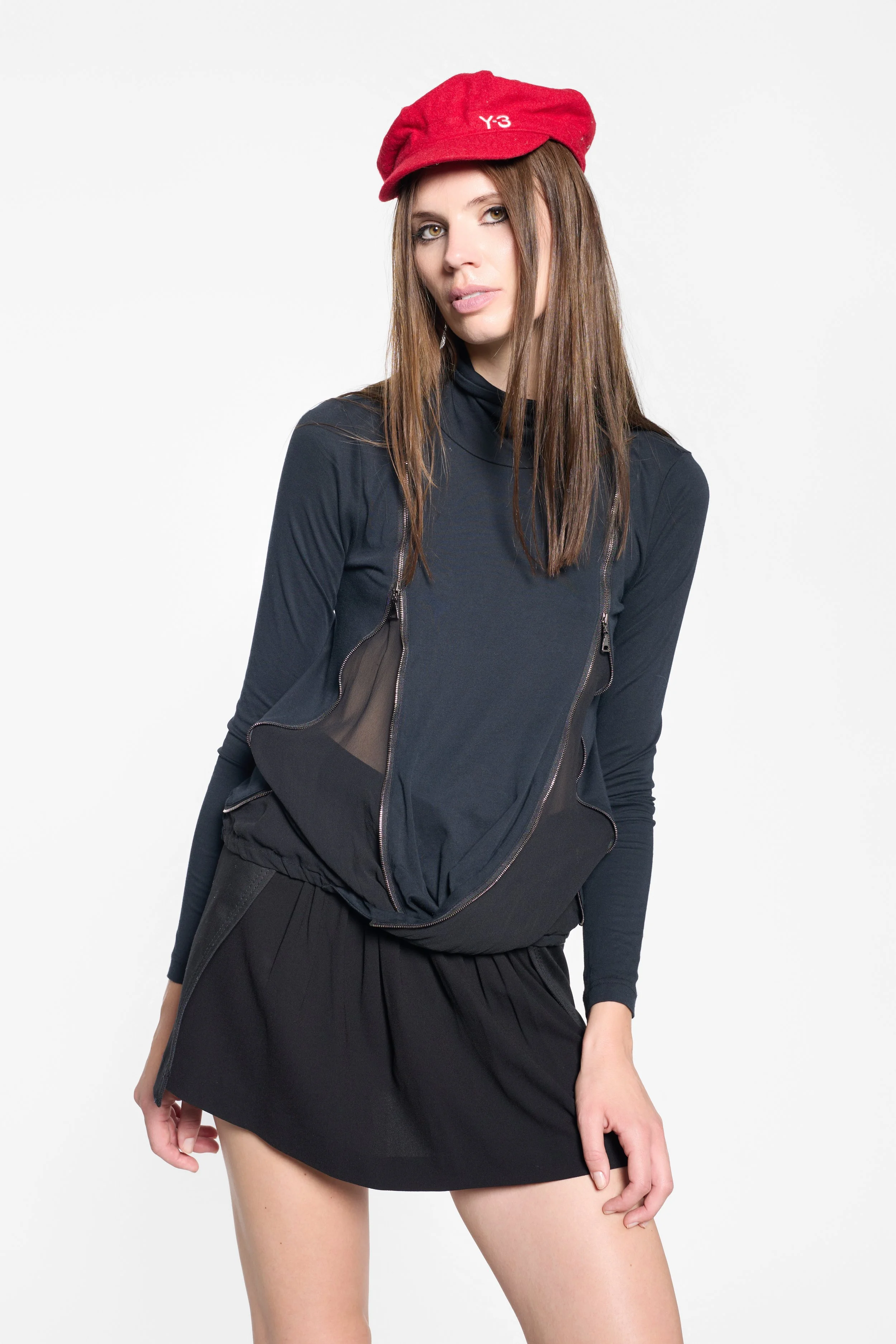Detail of sheer side panel and zip-open silk section on LUXXM top