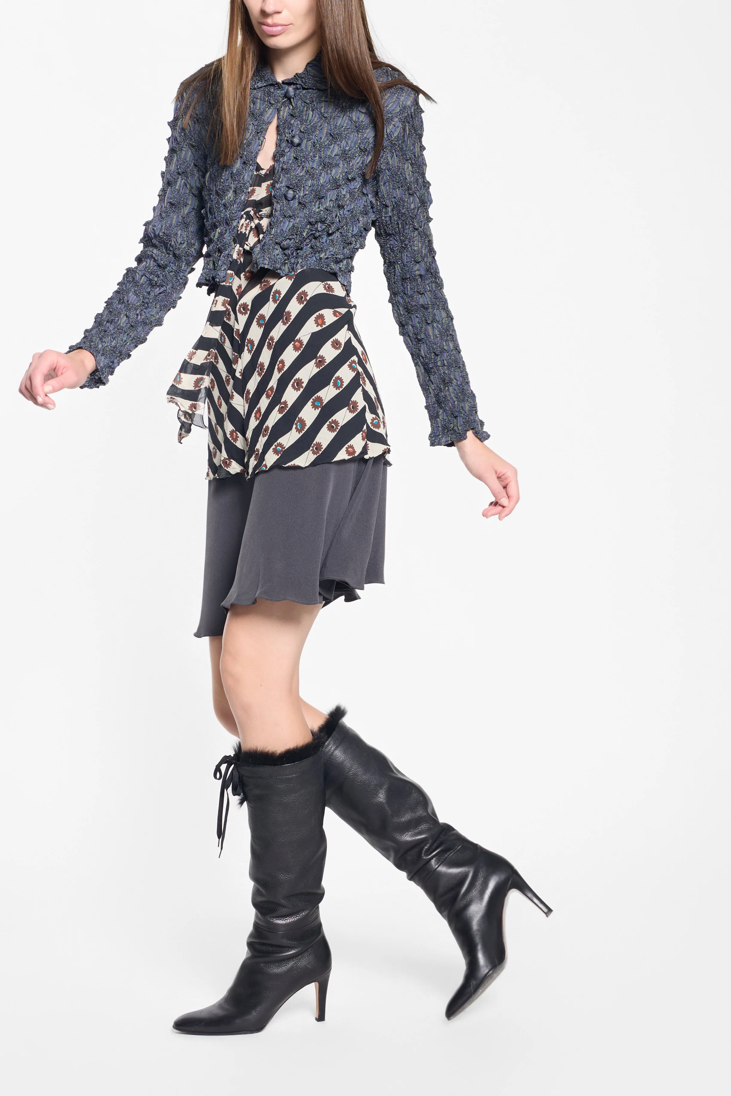 Joseph charcoal silk mini skirt styled on model, full-length editorial image