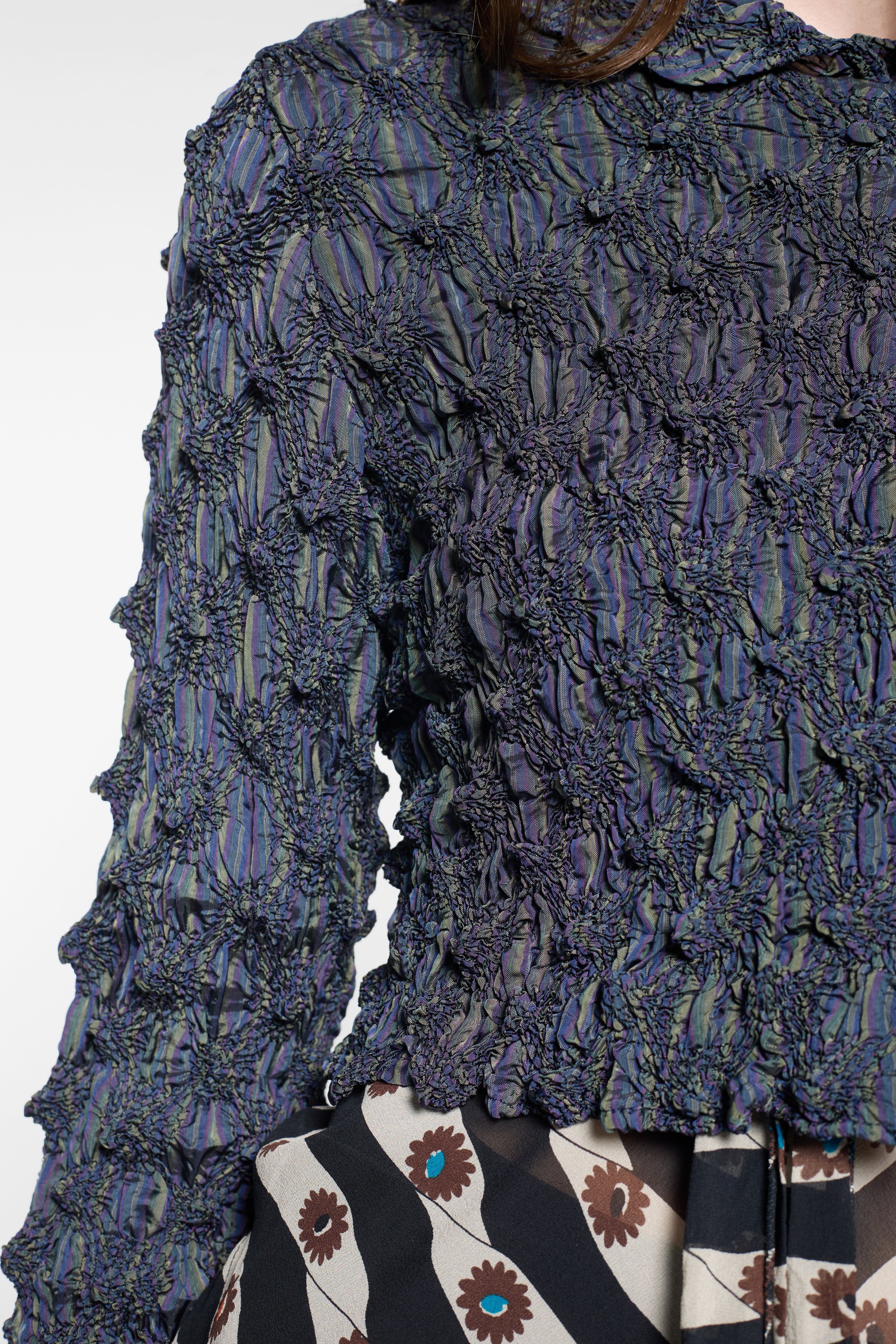 Detail of rounded collar and shibori-style texture on vintage Kensho Abe jacket