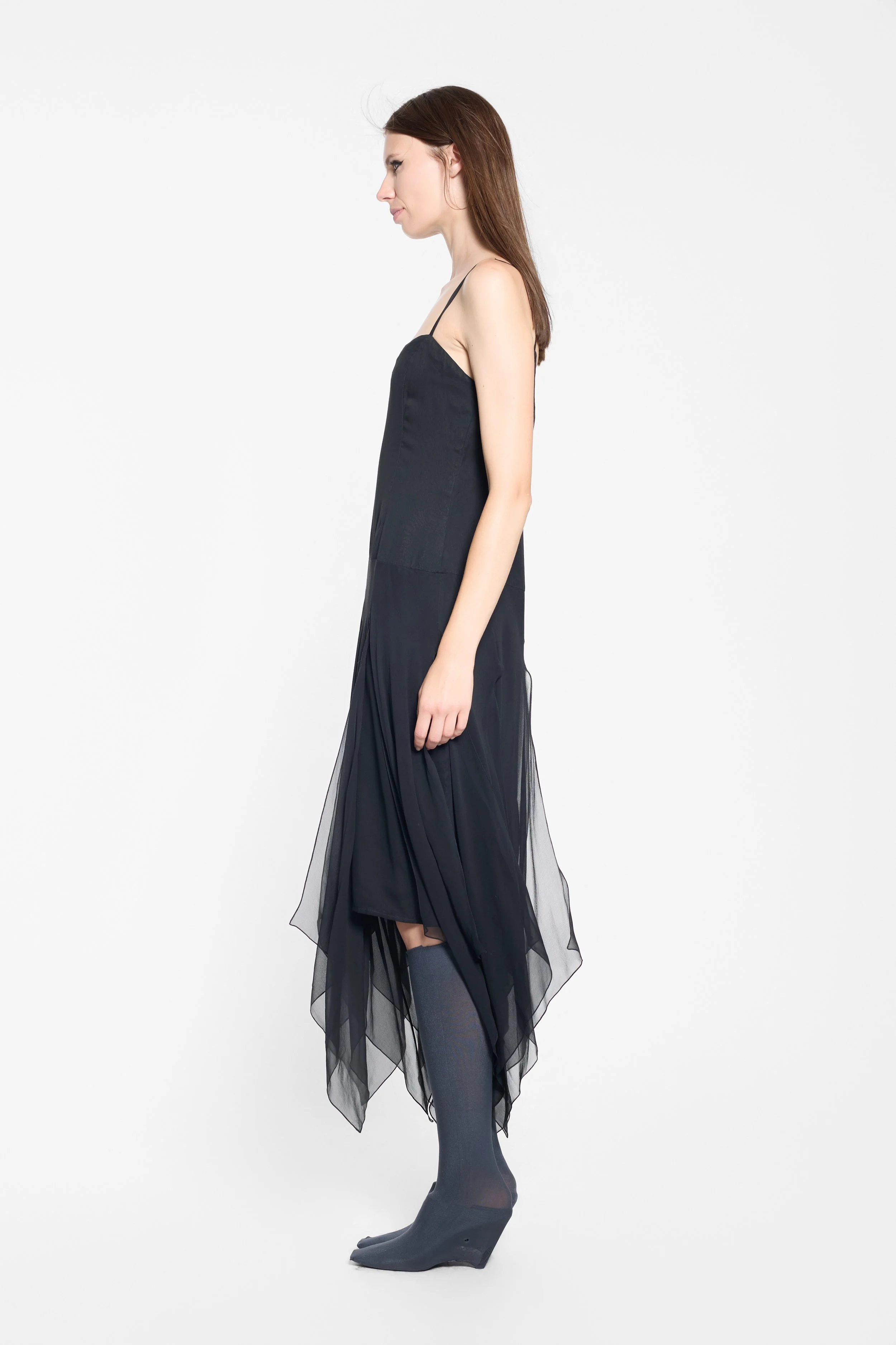 Side view of vintage Oleg Cassini black silk dress