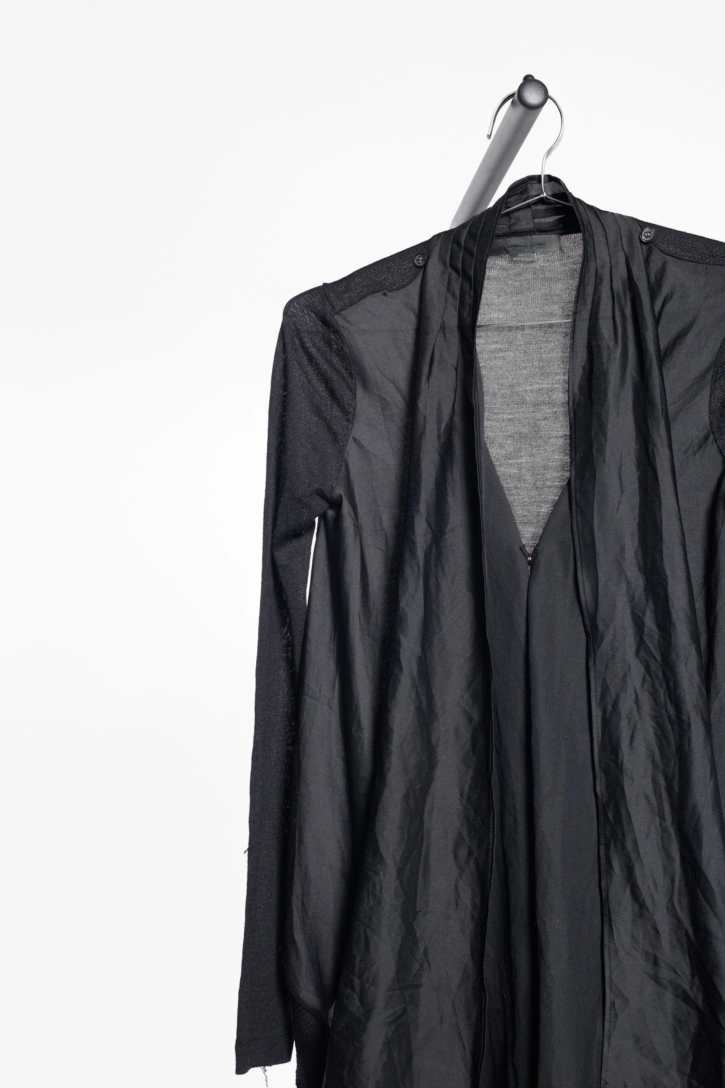 Front view of Alexander Wang asymmetric black cardigan