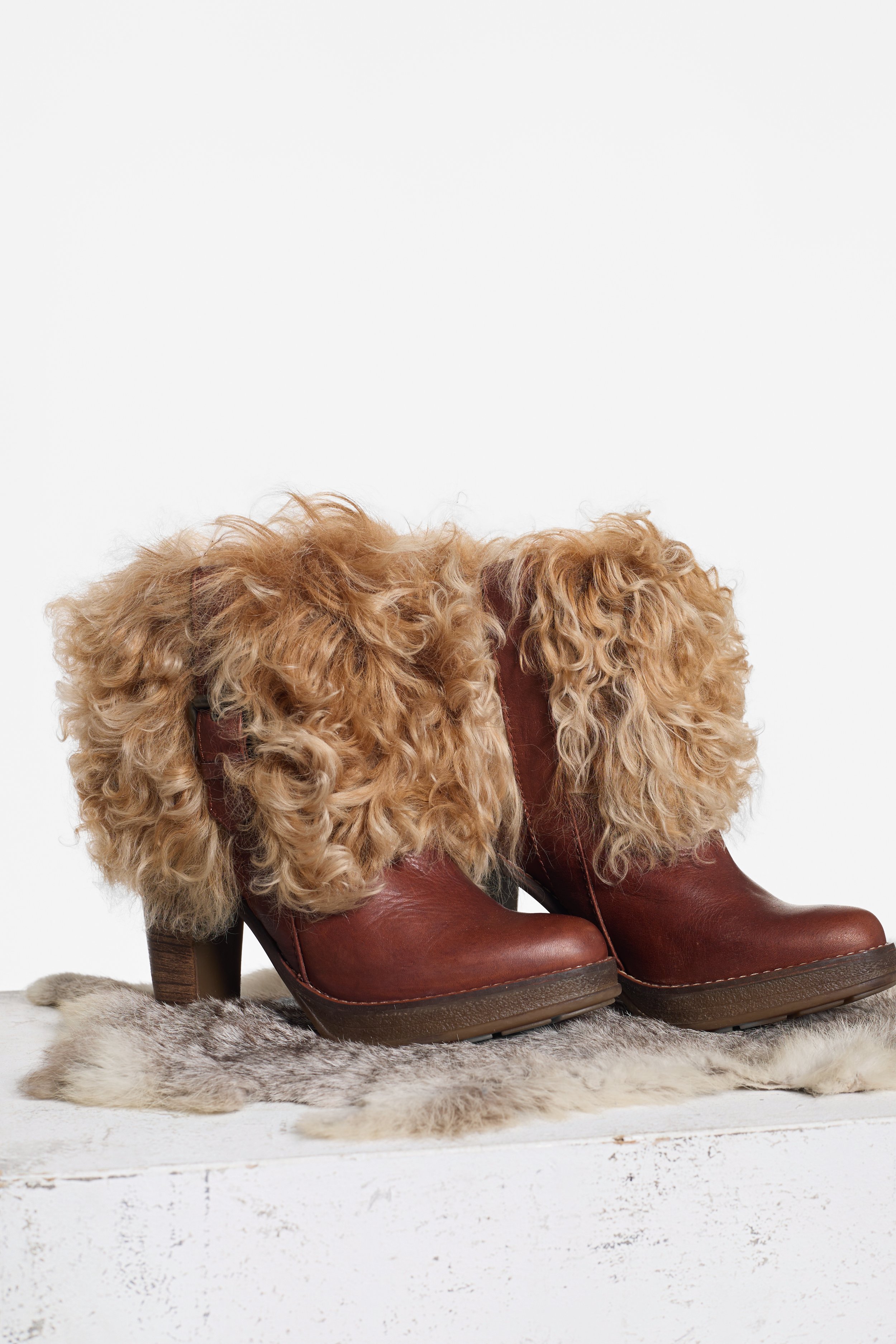 Side view of RAS brown leather boots with 4-inch heel