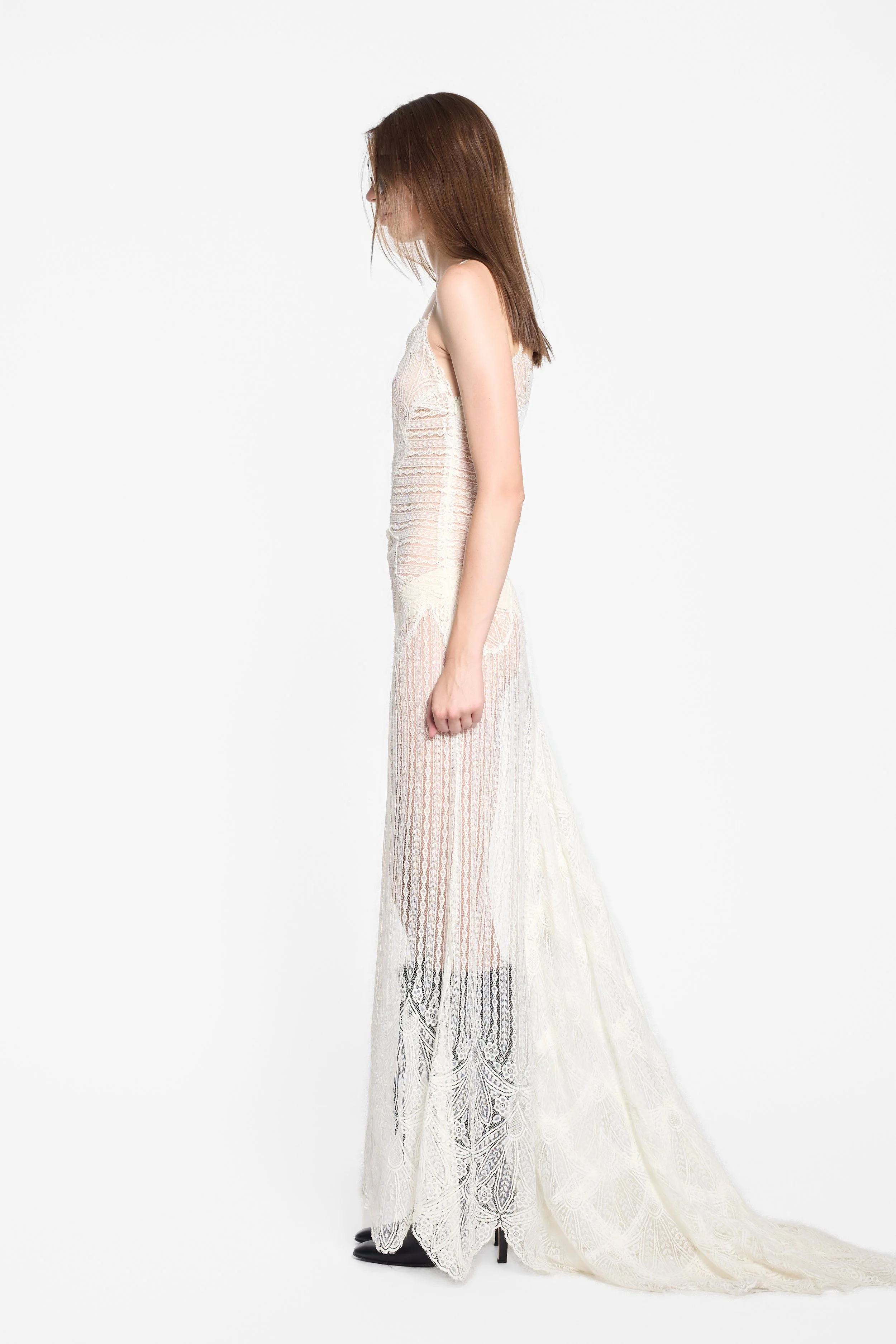 Side view of Anna Kara sheer lace floor-length gown
