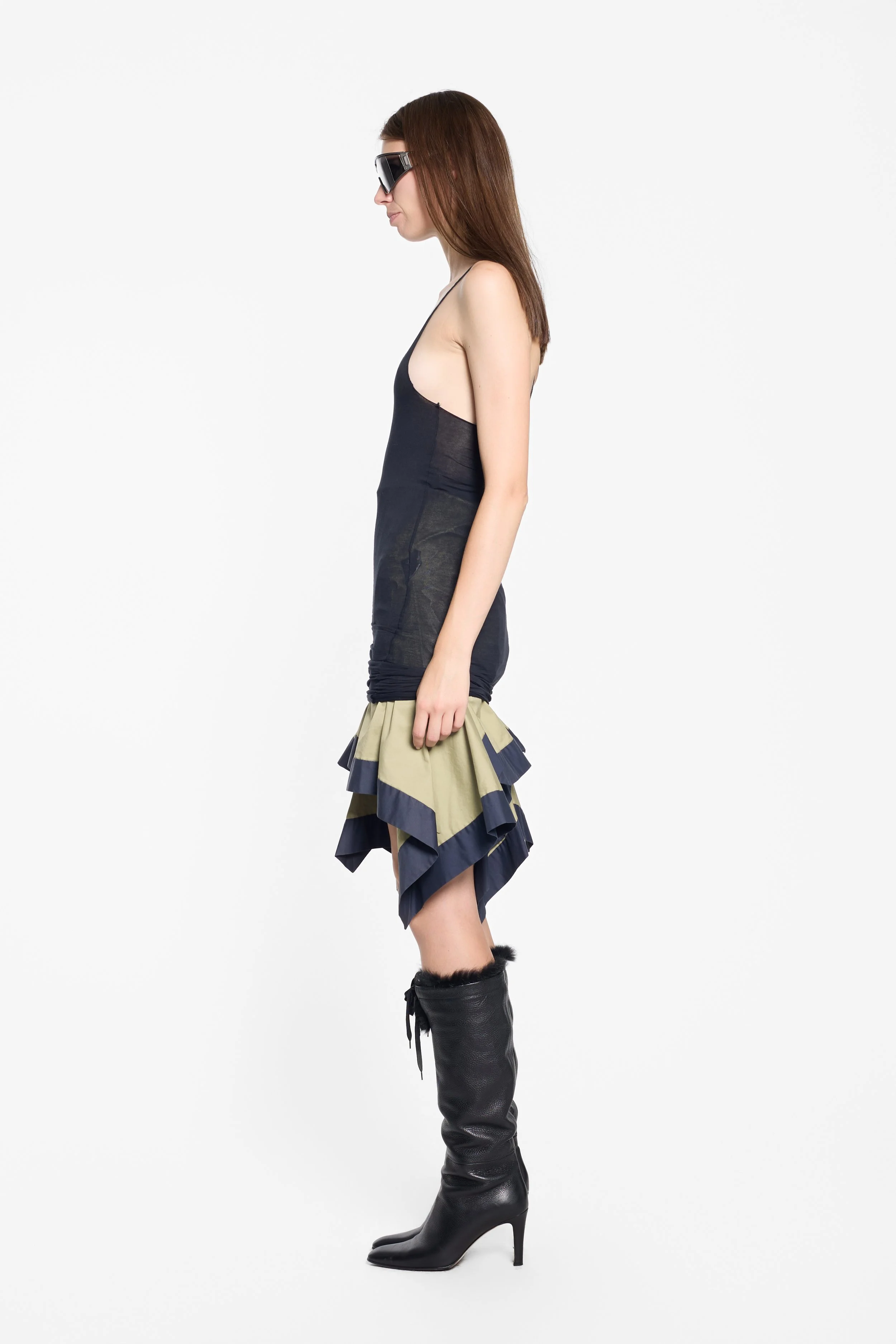 Janus black sheer racerback vest worn on model, side view