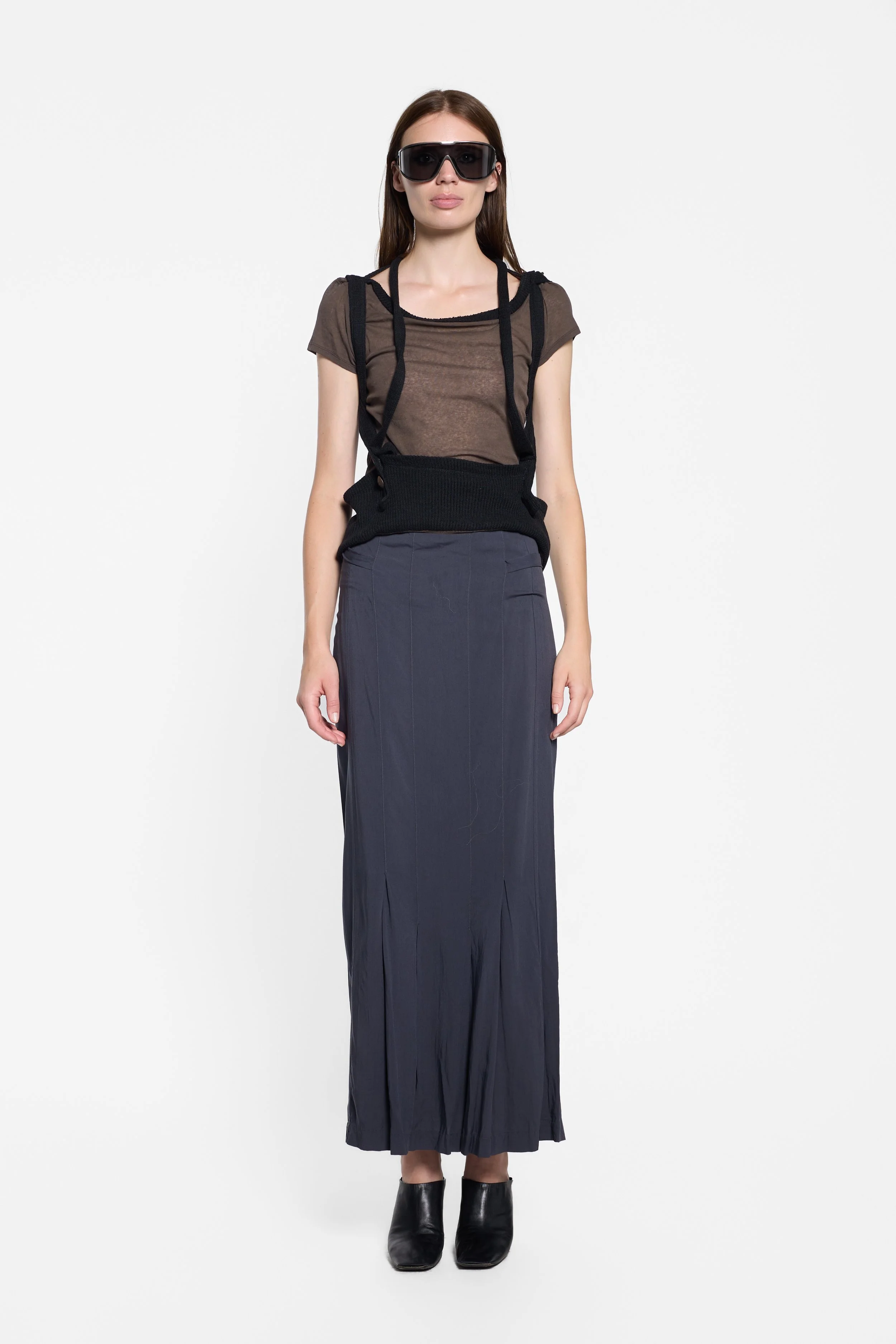 Front view of LUXXM brown knit top with crossed suspender straps