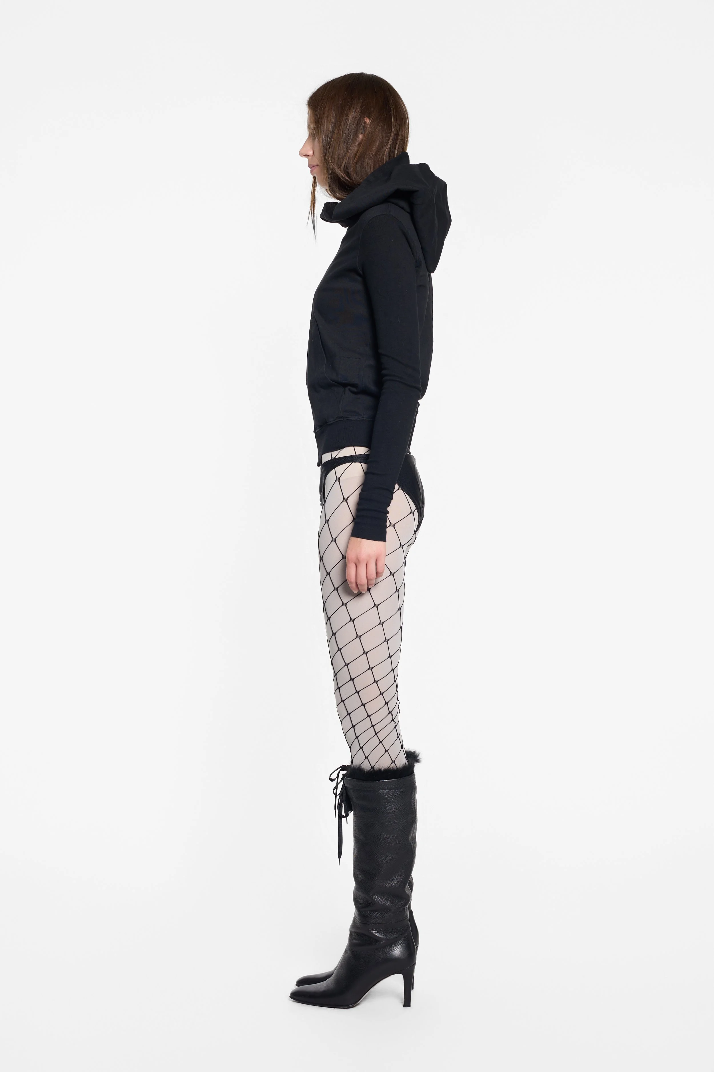 Side view of DRKSHDW black hoodie with oversized sculptural hood
