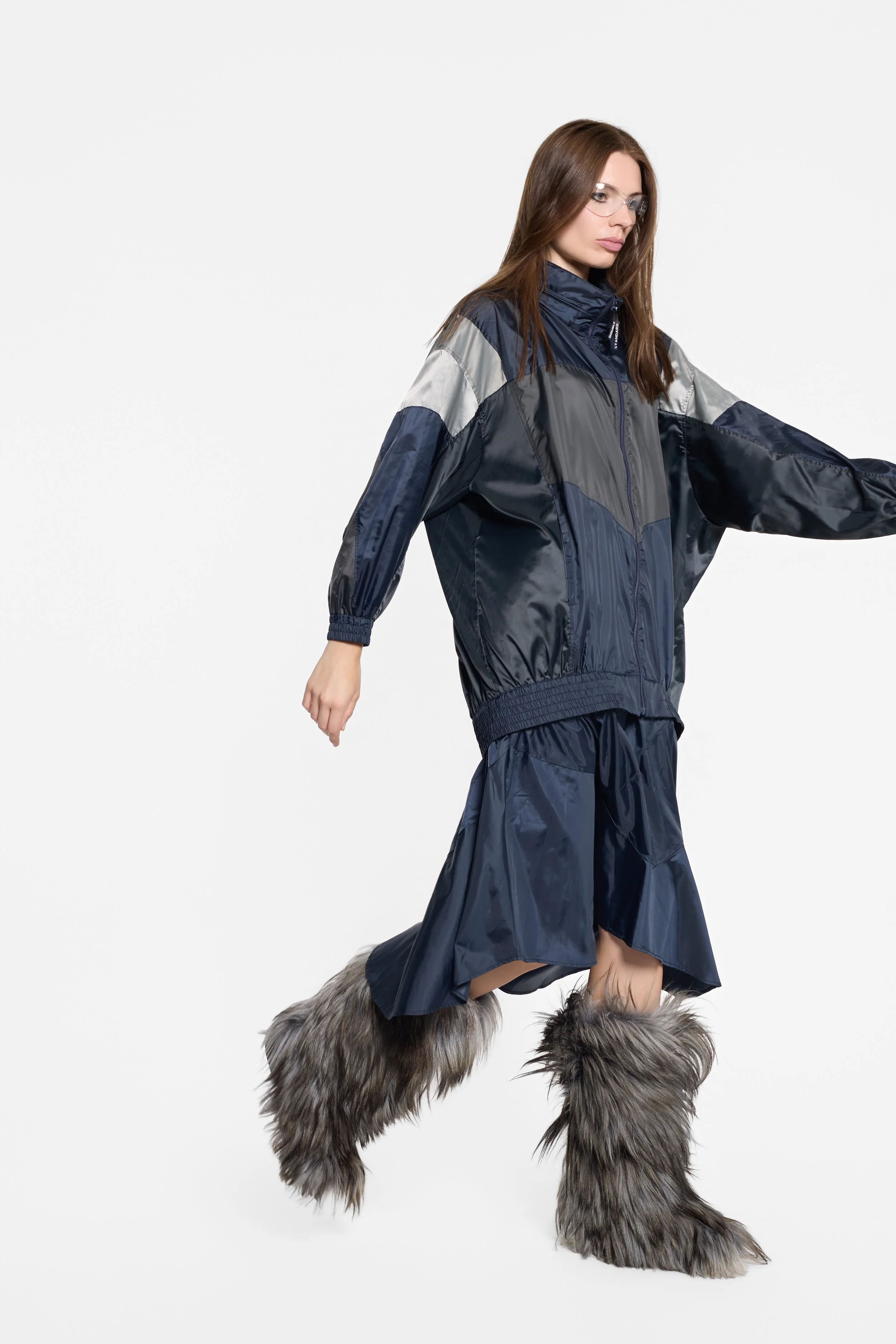 Model wearing Double Standard transformable nylon jacket dress