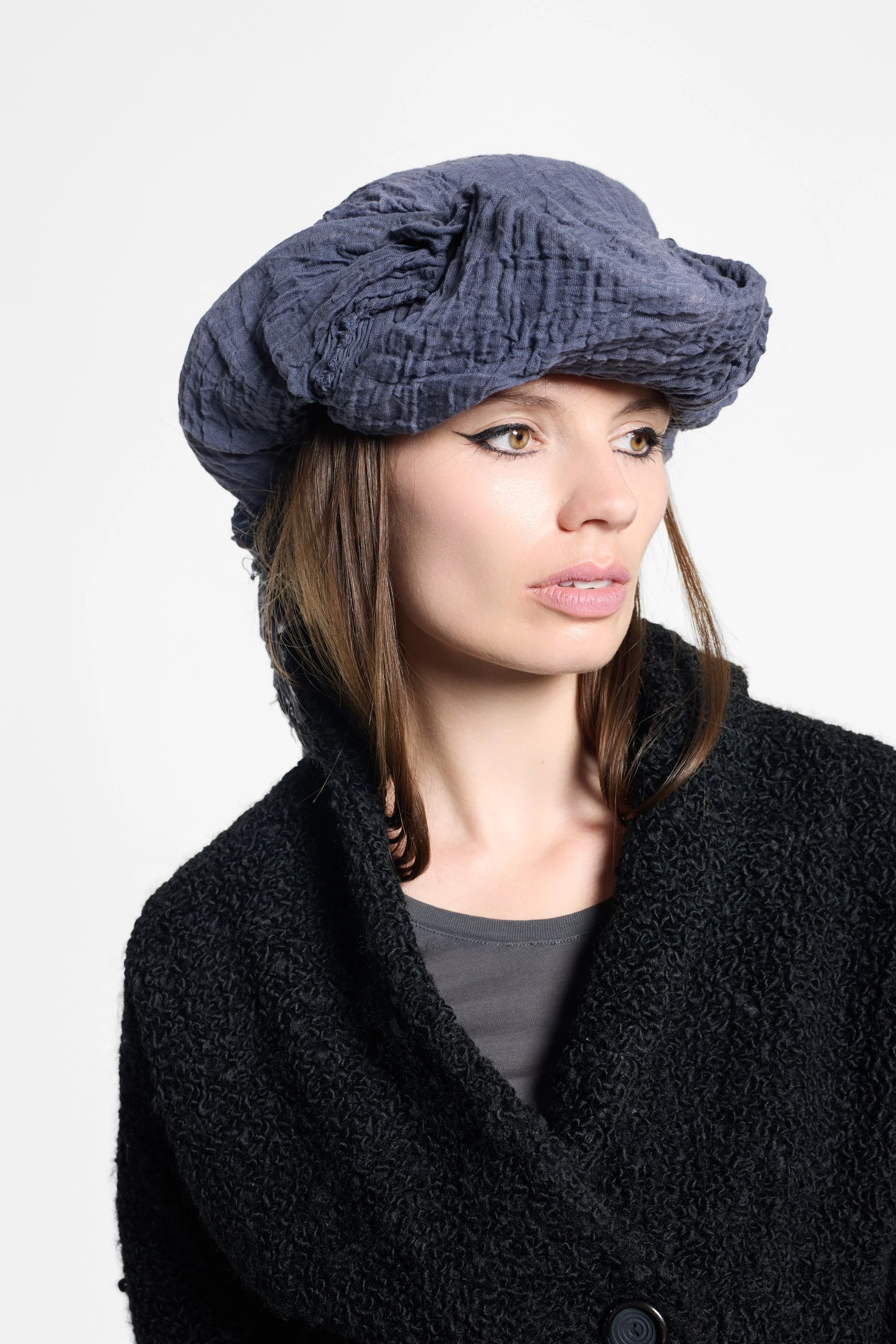 Close-up of hand-distressed cotton muslin wrapped around MVUDSLYDE hat