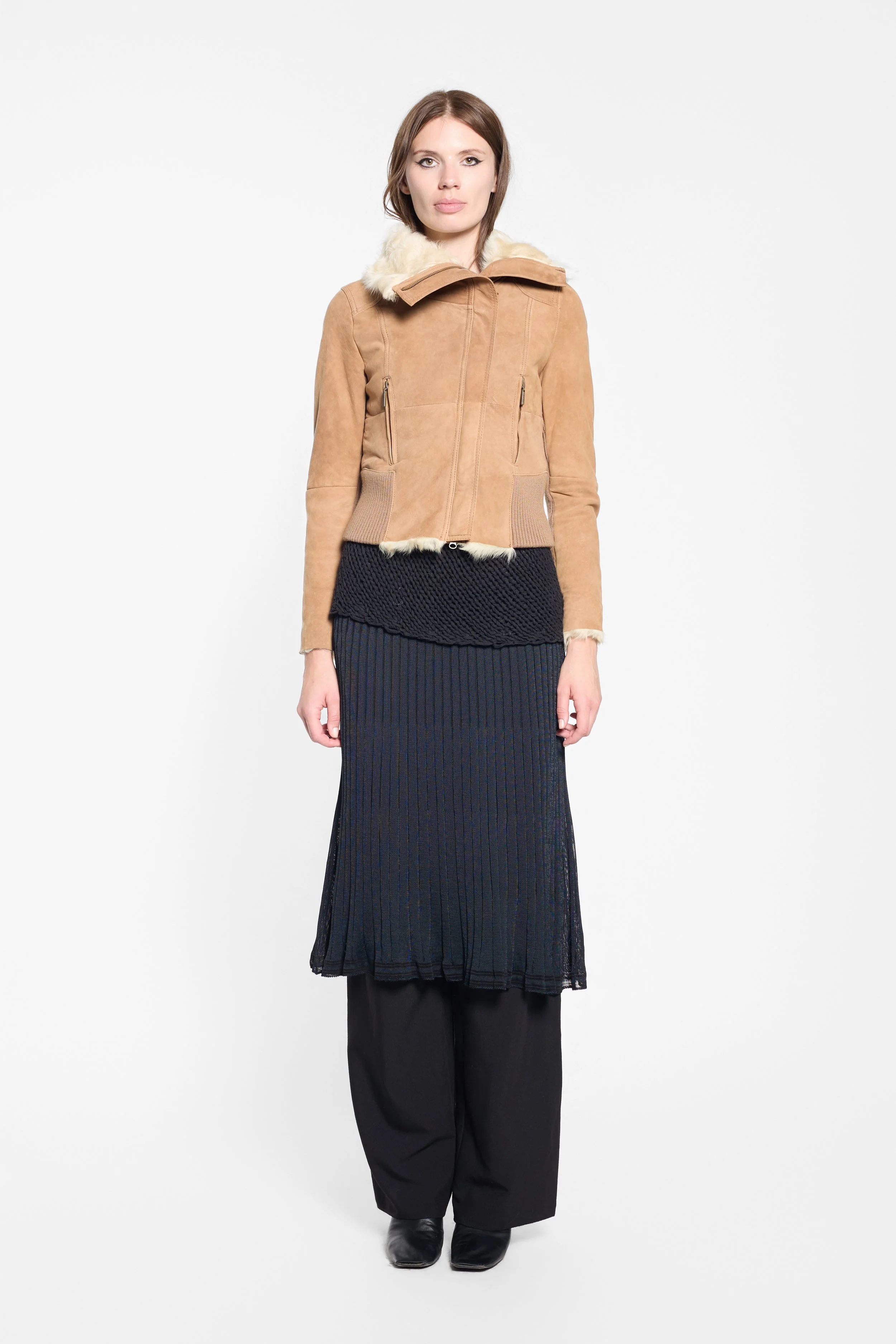 Model wearing Chelseagarb tan cropped sheepskin jacket