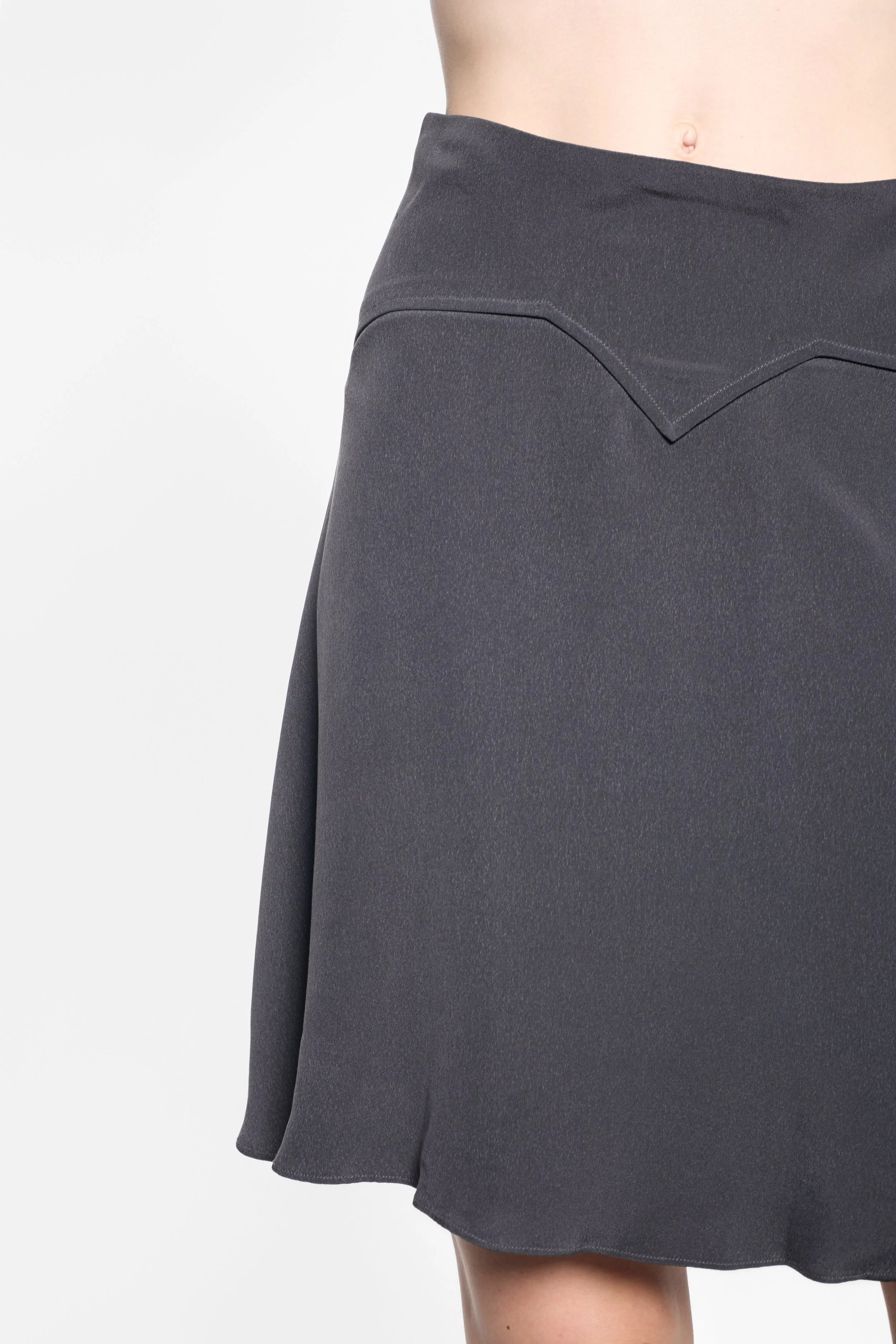 Joseph silk mini skirt, clean waistband and pointed front seam detail