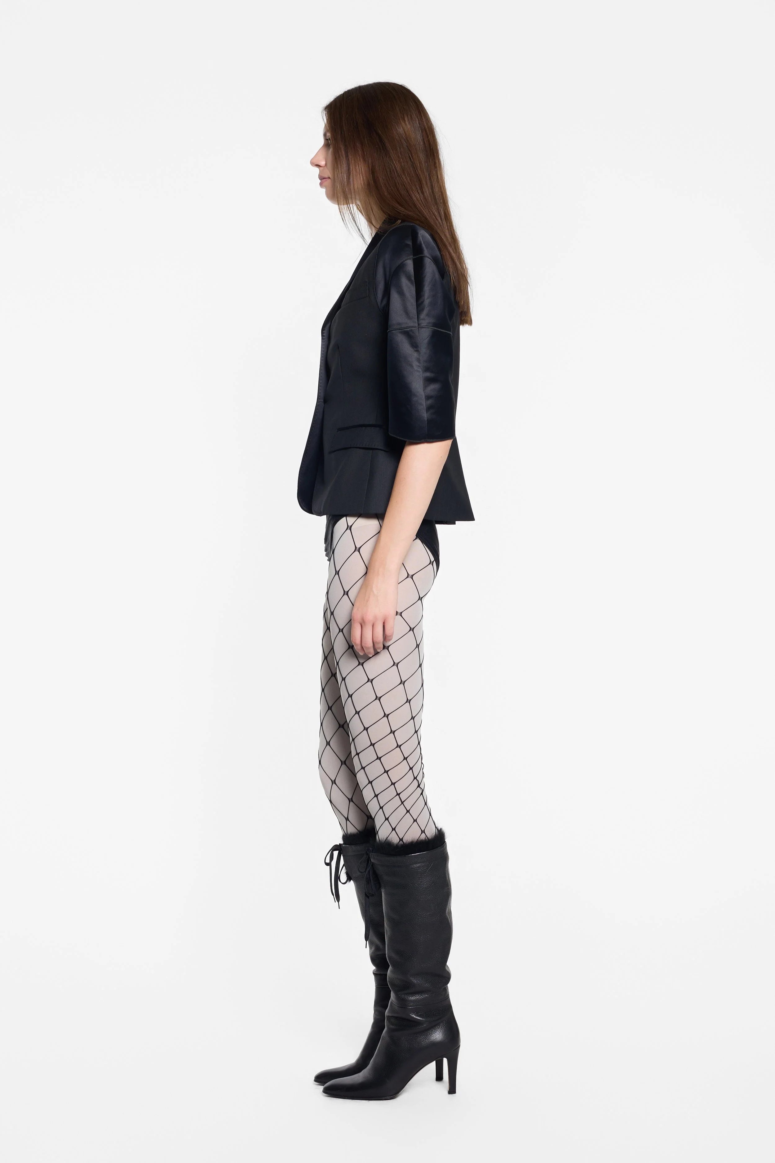 Side view of D&G fitted blazer showing sculpted sleeve shape