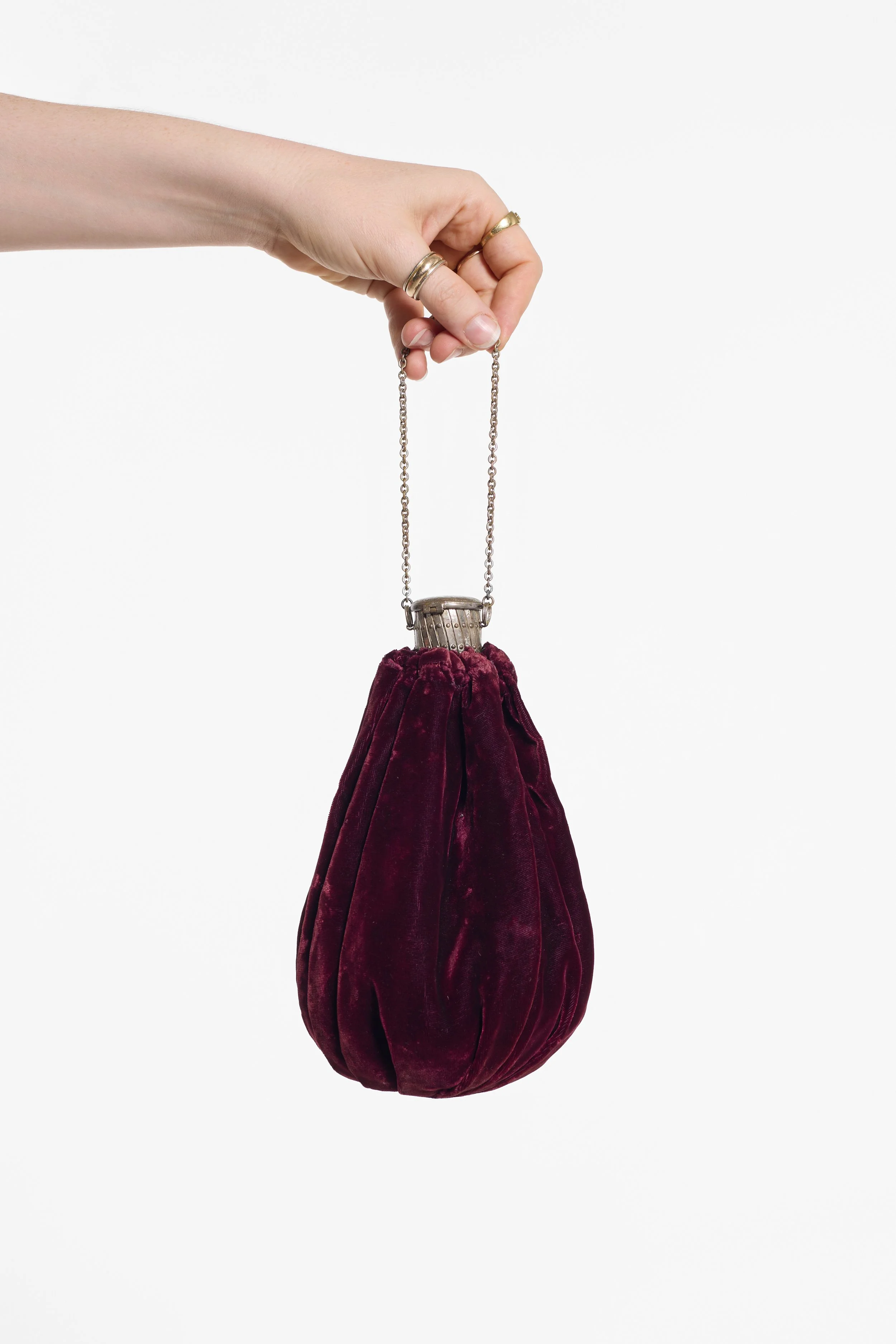 Burgundy evening purse with articulated metal gate frame