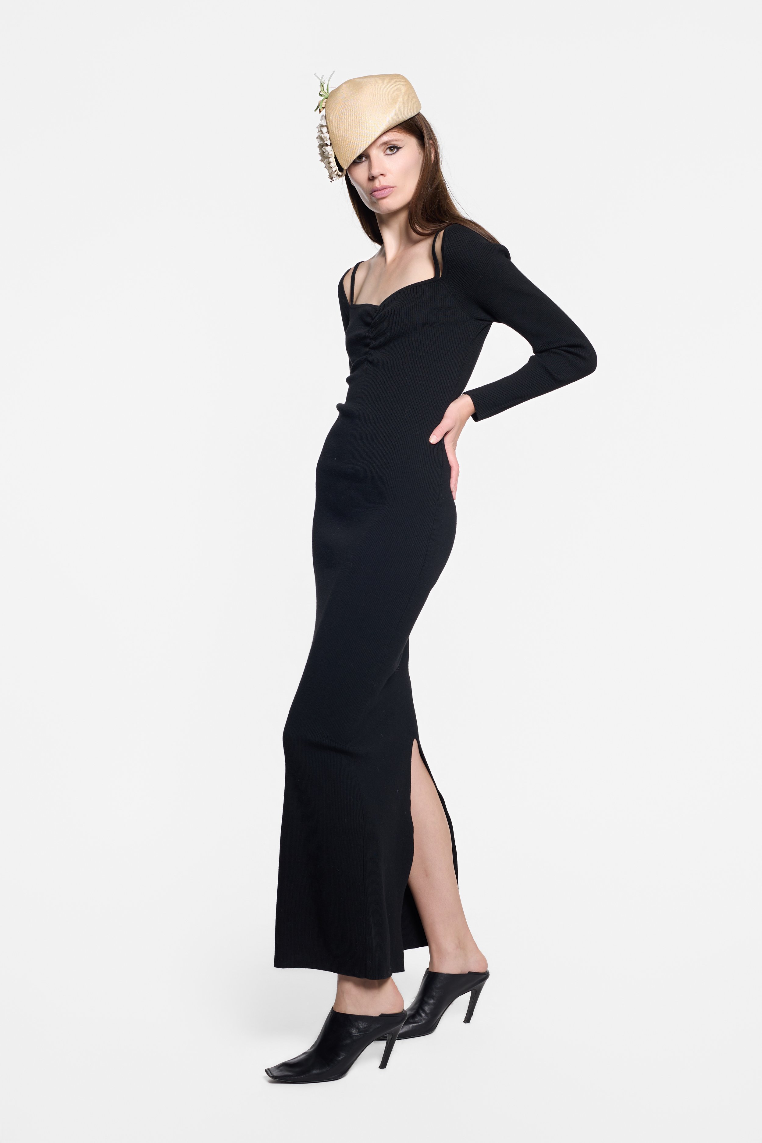 Model wearing Victor Glemaud black ribbed wool maxi dress