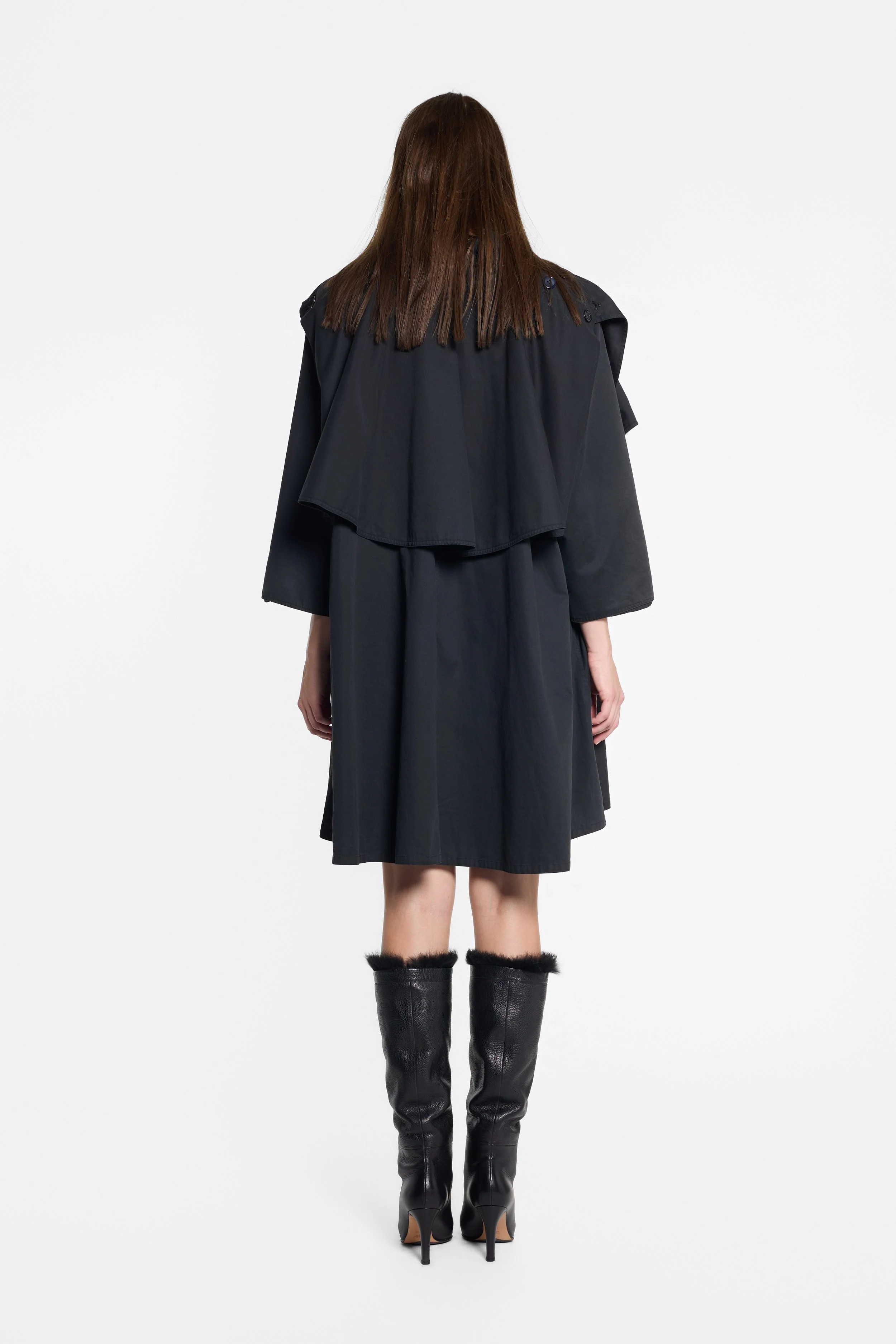 Back view of Emanuel Ungaro trench with layered draped panels