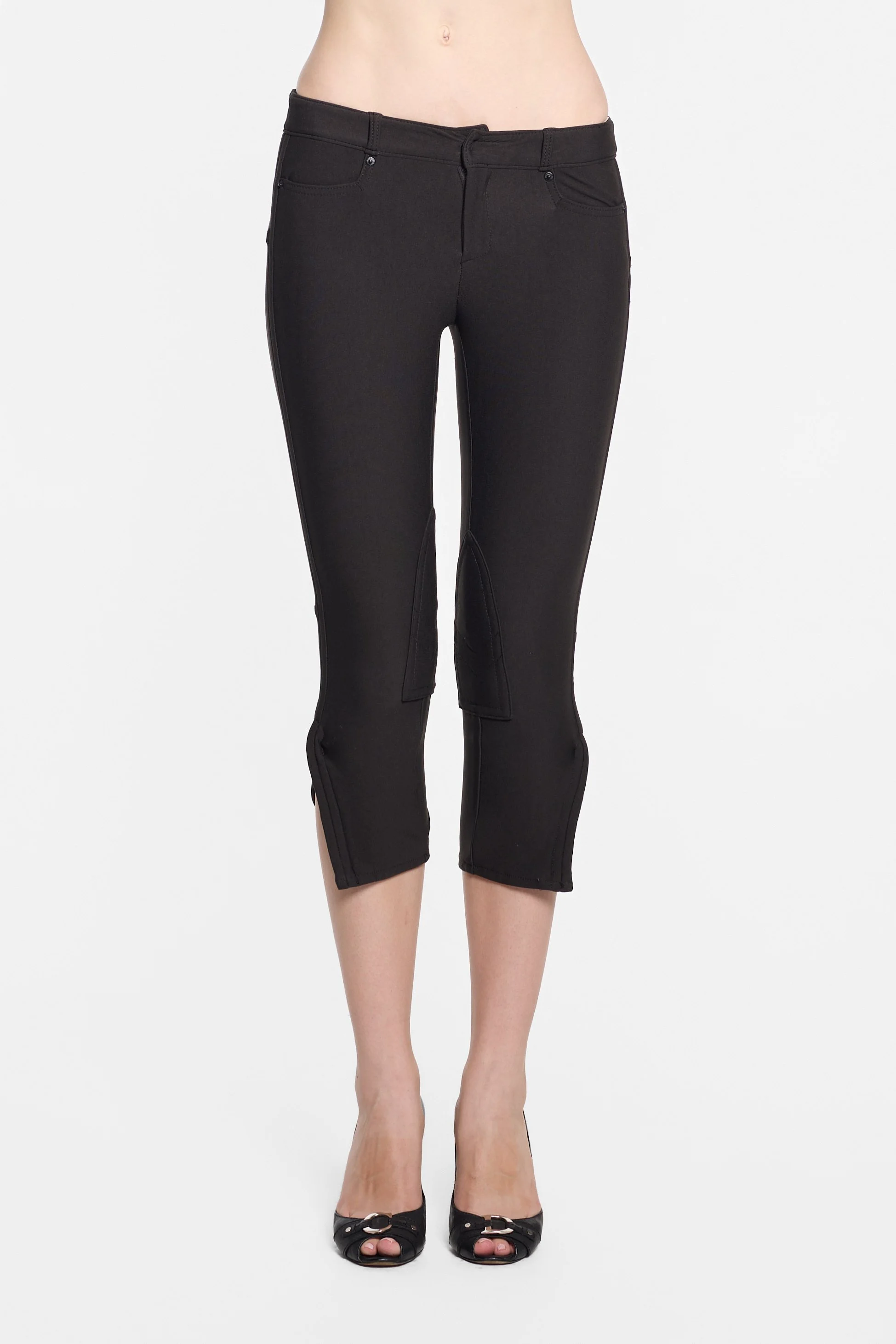 Front view of LUXXM black capri trousers with front pockets