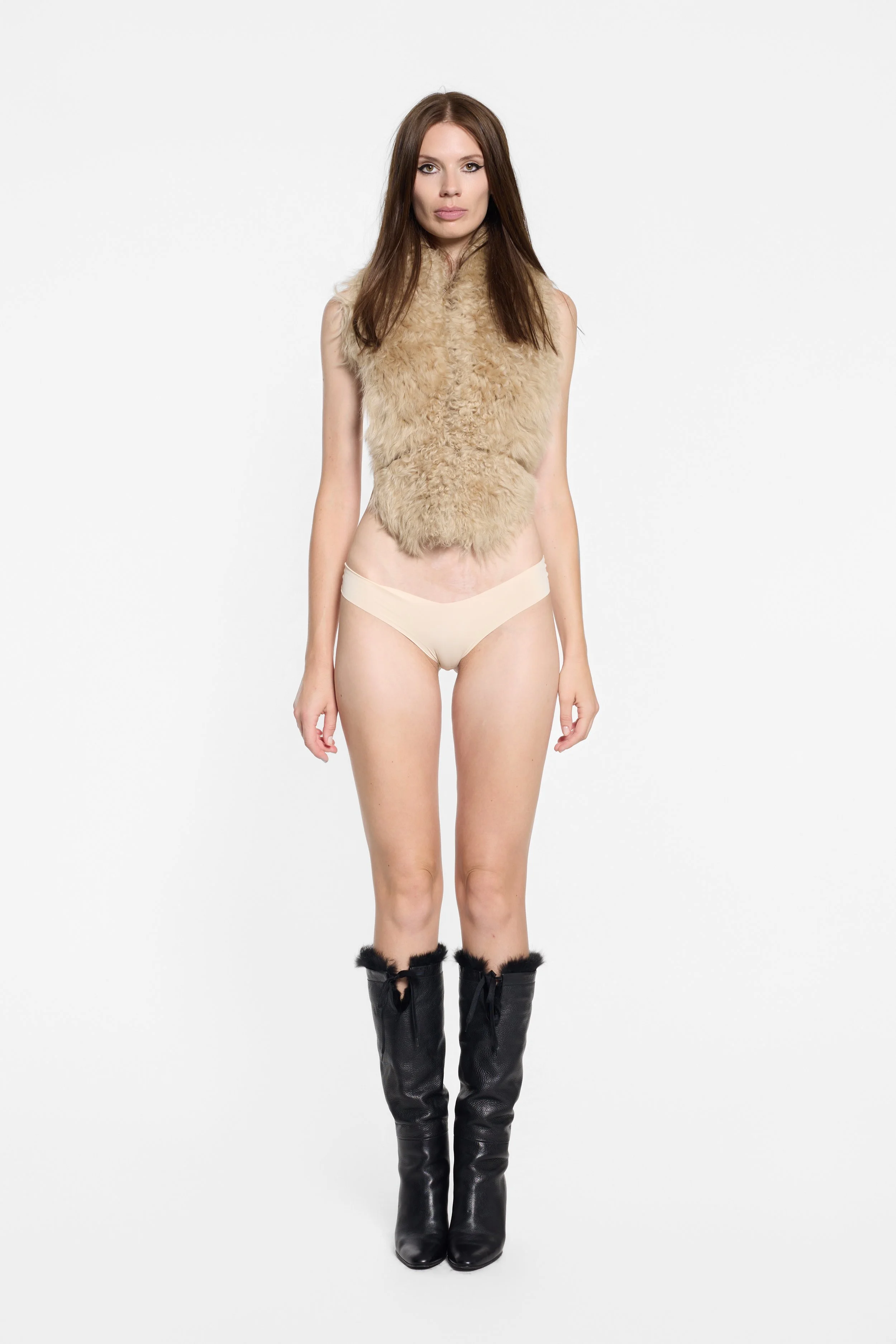 Front view of sheepskin fur scarf styled as a top