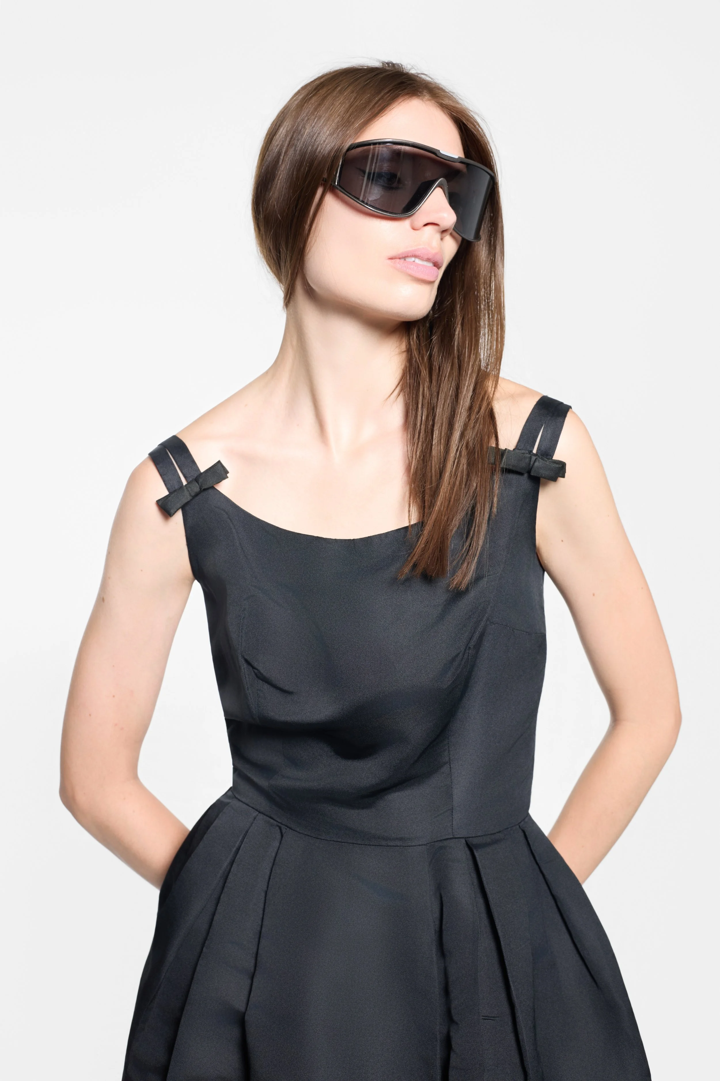 Harvey Berin black dress scoop neckline and bow strap detail