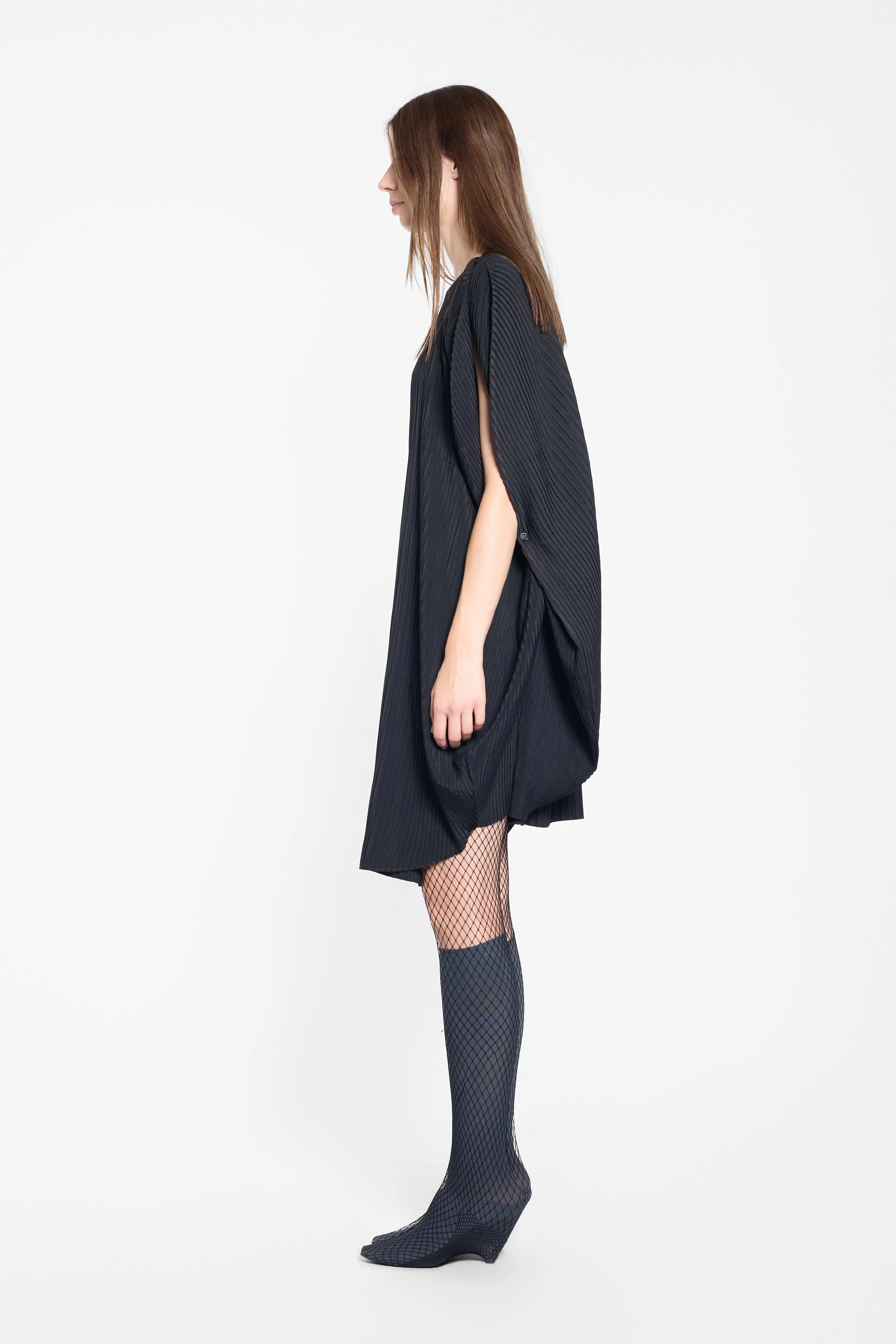 Cape-sleeve Issey Miyake cocoon dress, side profile