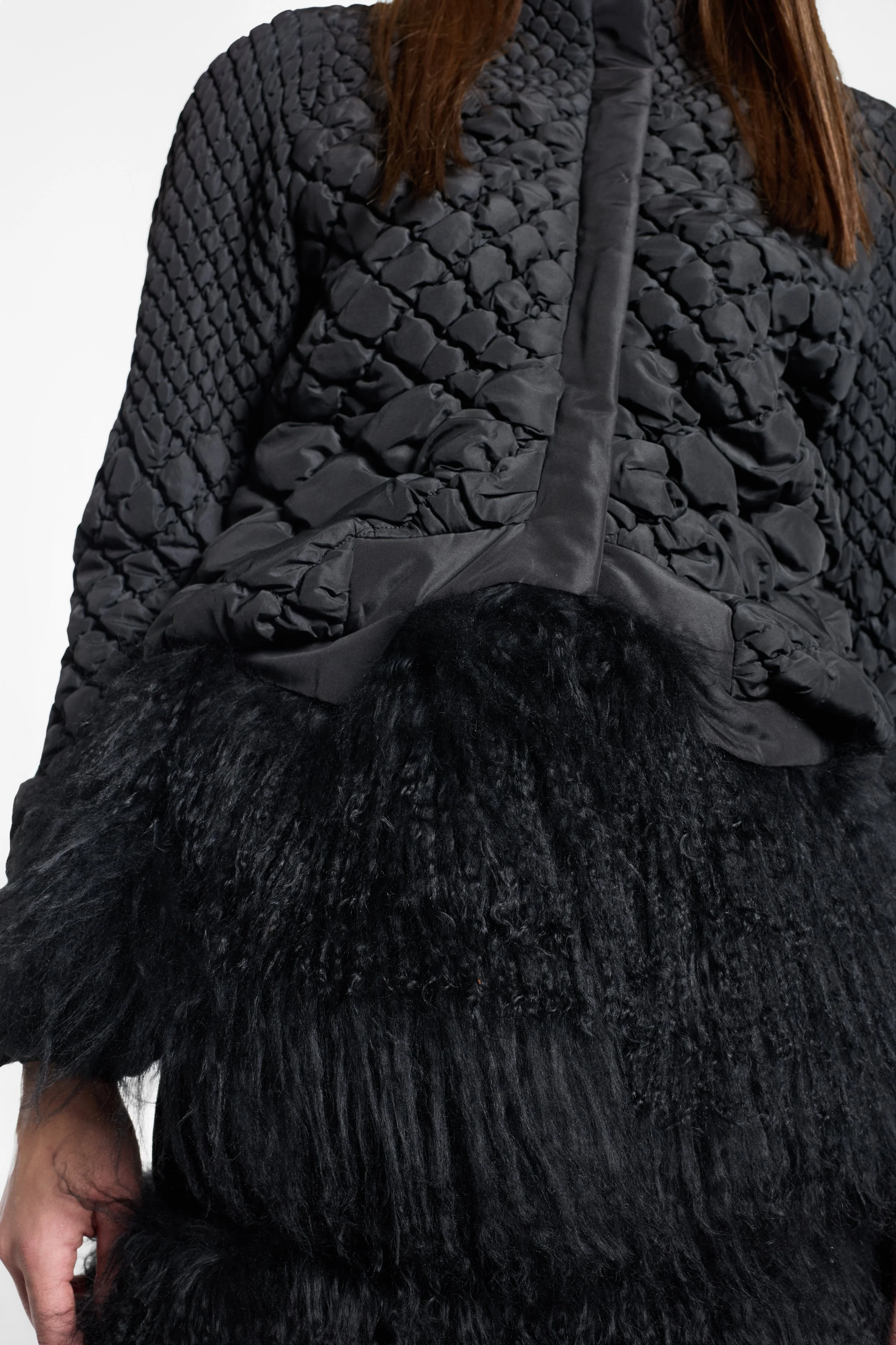 Close-up of diamond shirring and silk cotton texture on Max Blue jacket