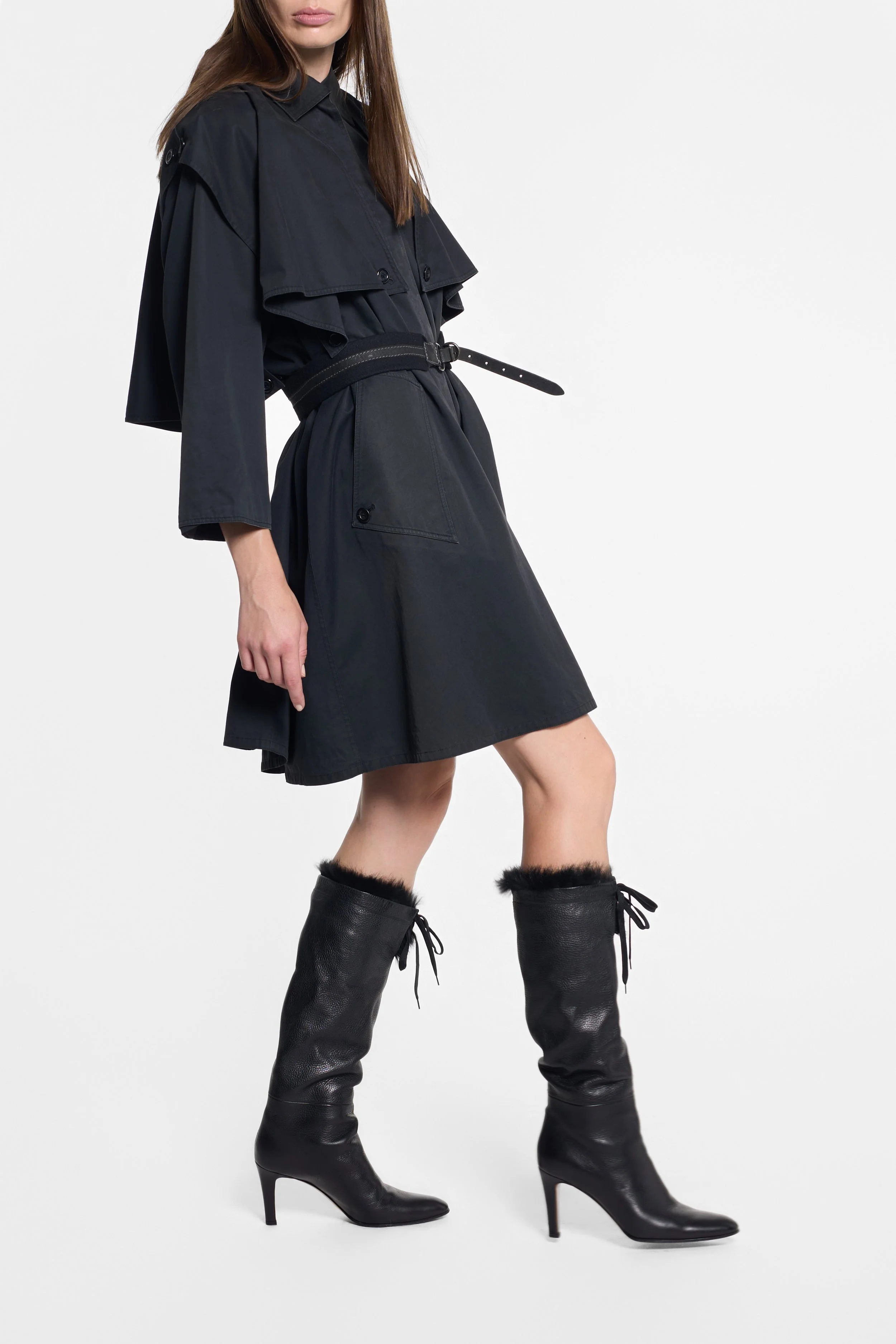 Model wearing vintage Emanuel Ungaro navy sculptural trench coat