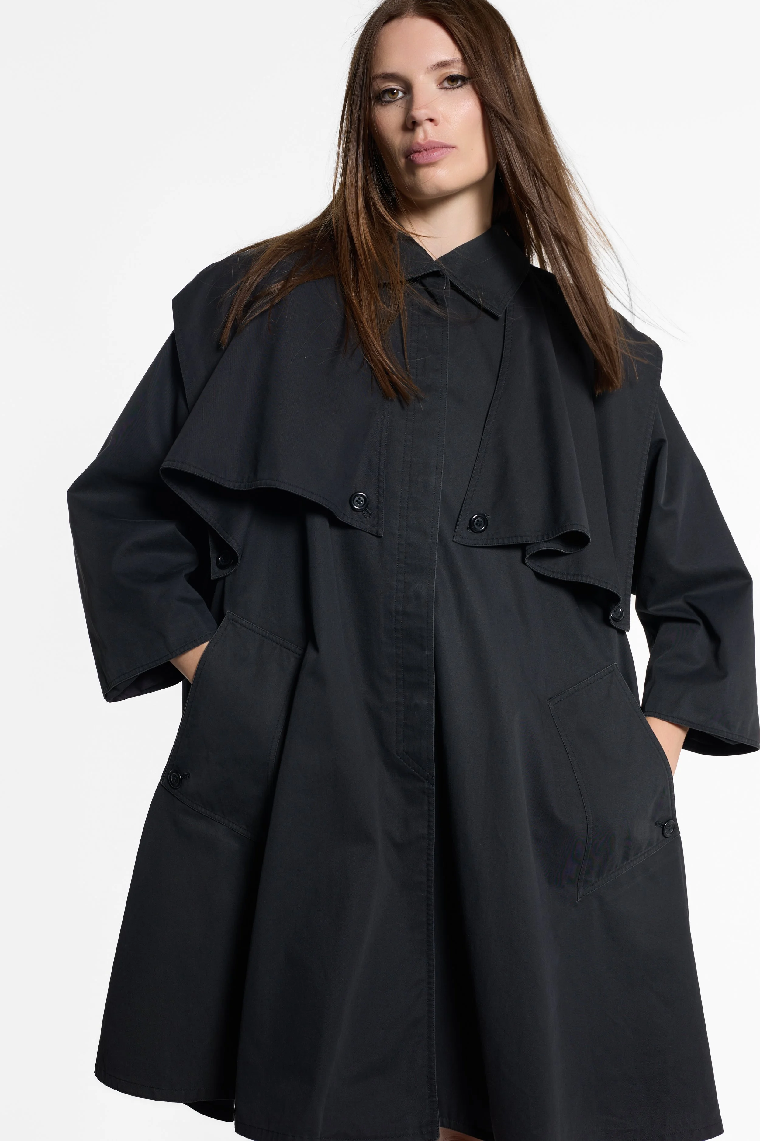 Close-up of pointed collar and concealed button fastening on Emanuel Ungaro coat