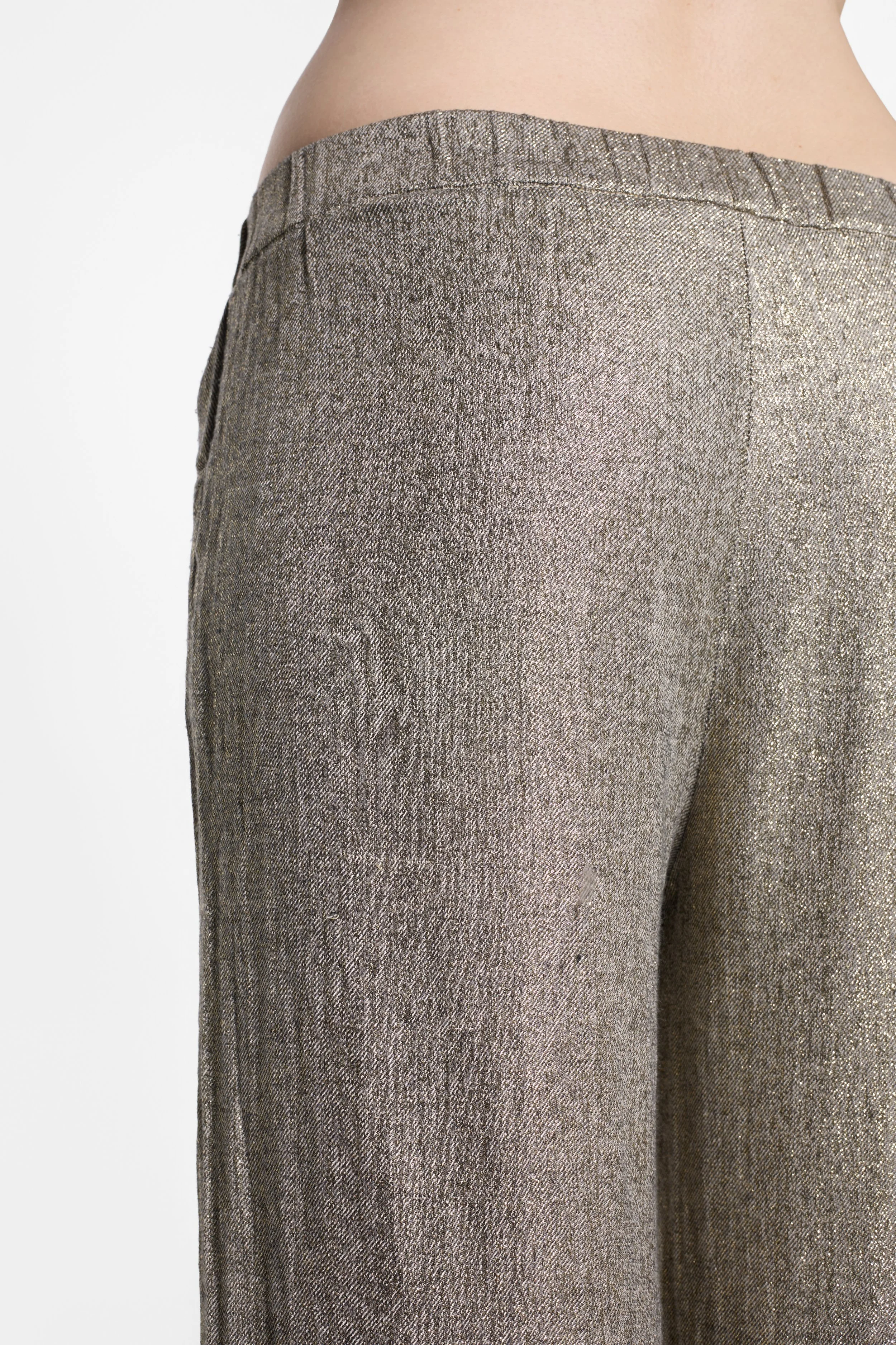 Close-up of antique metallic finish on Diega trousers