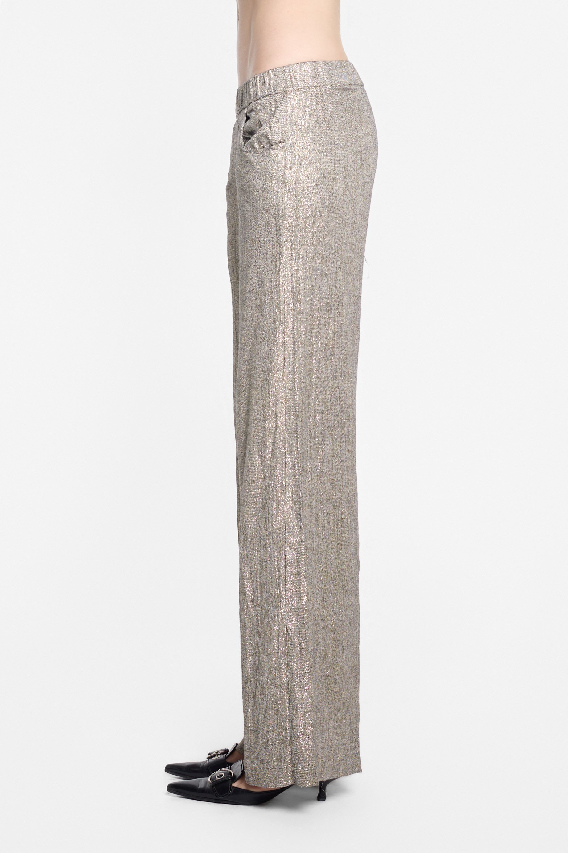 Side view of Diega antique gold trousers with relaxed leg