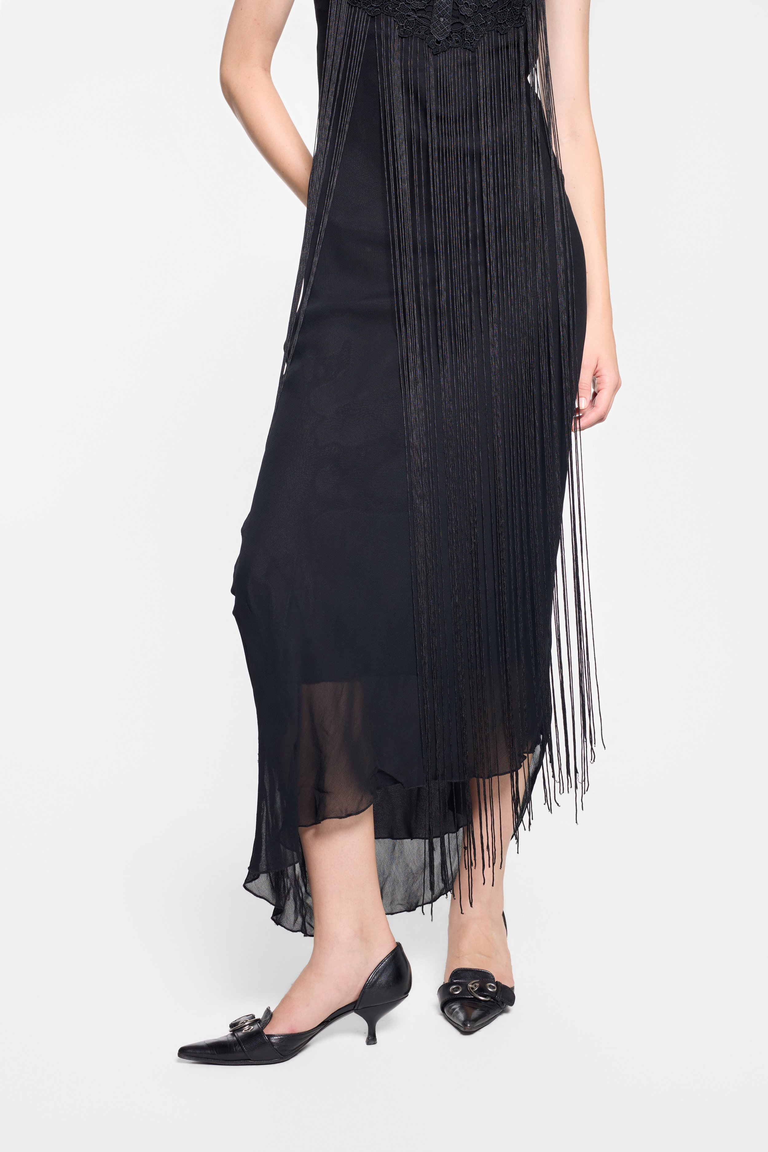 Asymmetric hem and long fringe detail, O by Isabel Kristensen