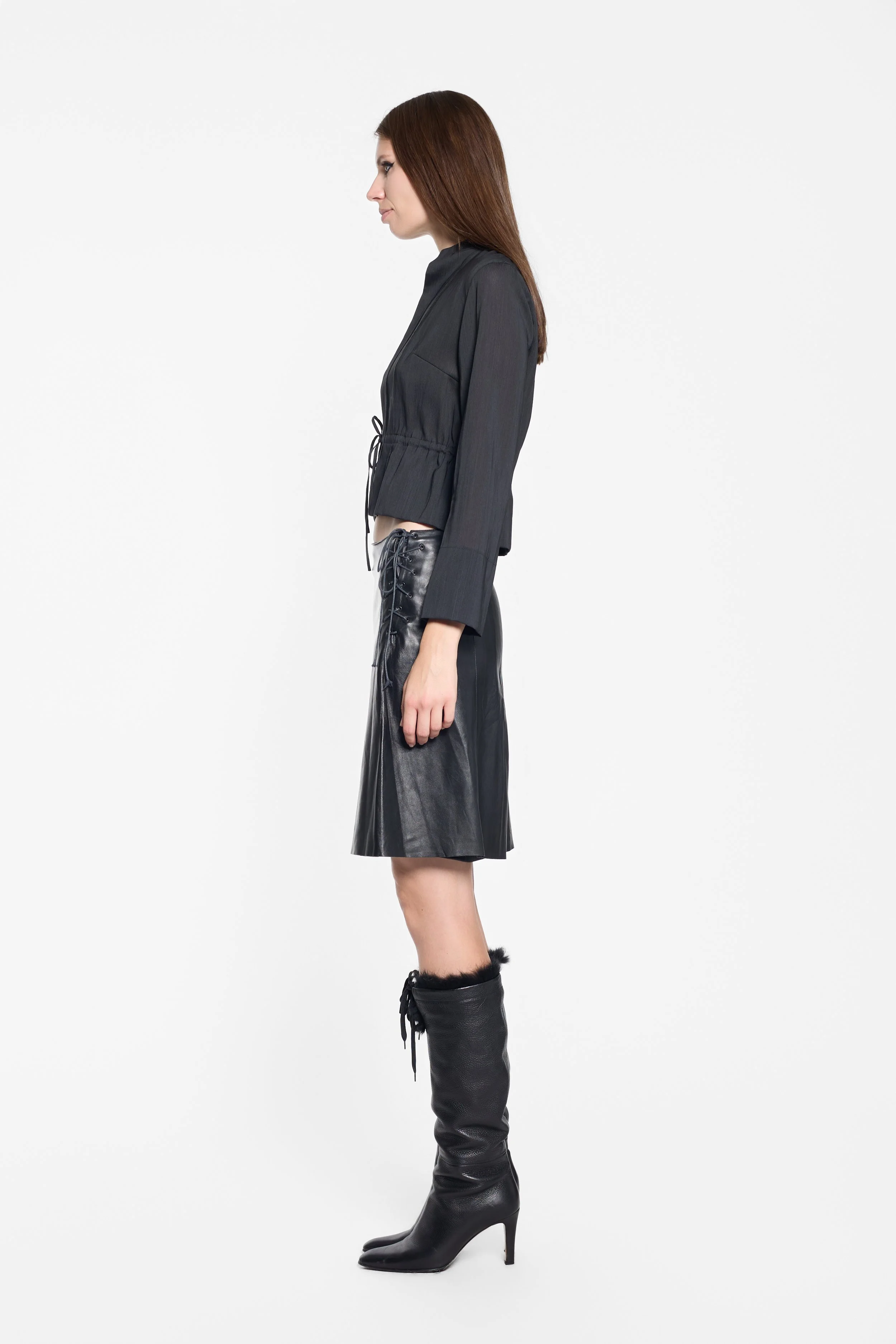 Vintage 1990s Karl Lagerfeld black cropped jacket worn on model, side view