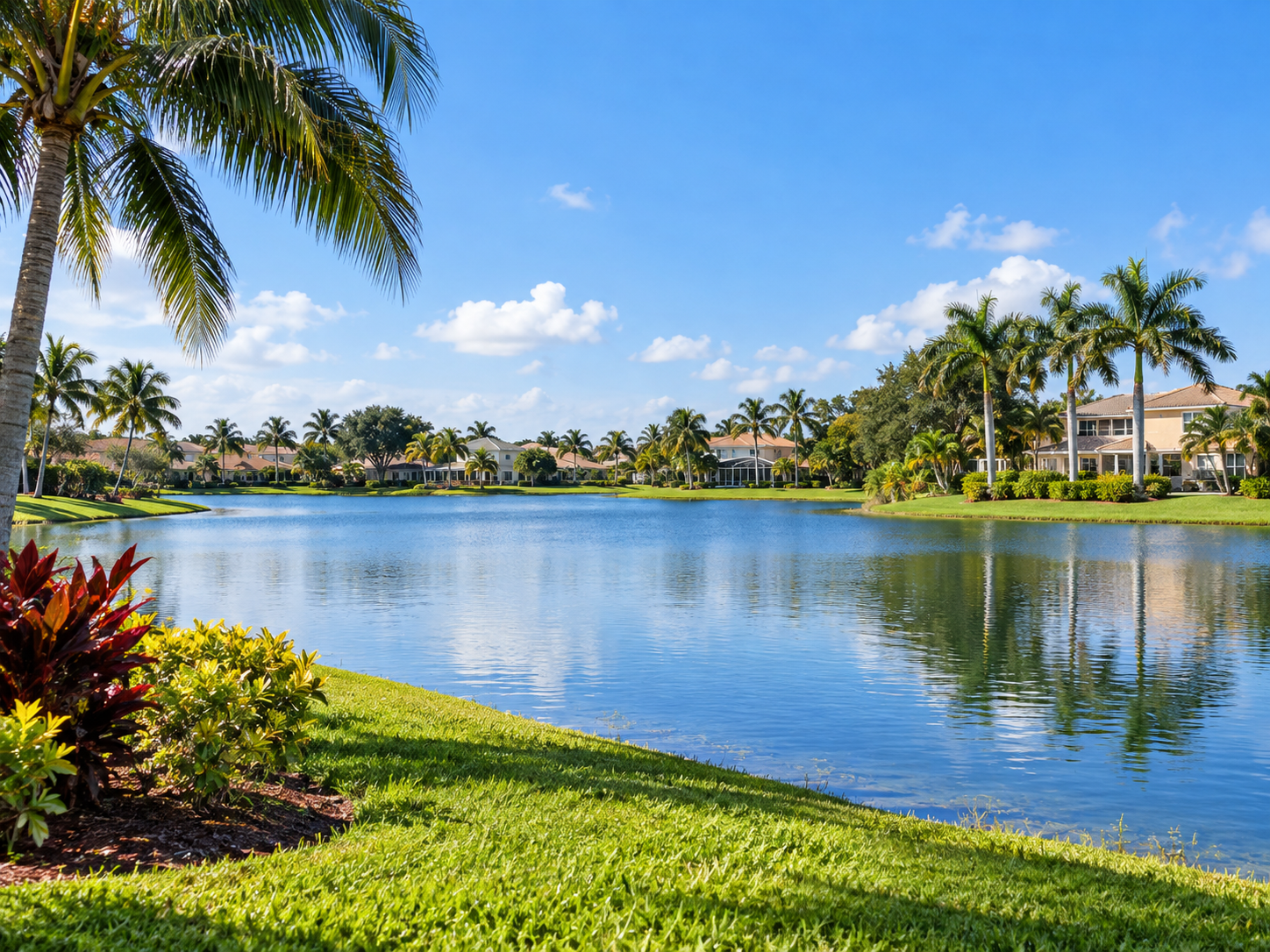 Palm-lined lake and residential community representing Pembroke Pines, Florida.