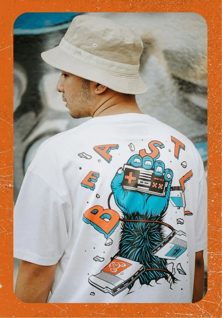 Back side of man wearing stylish color DTG graphic t-shirt