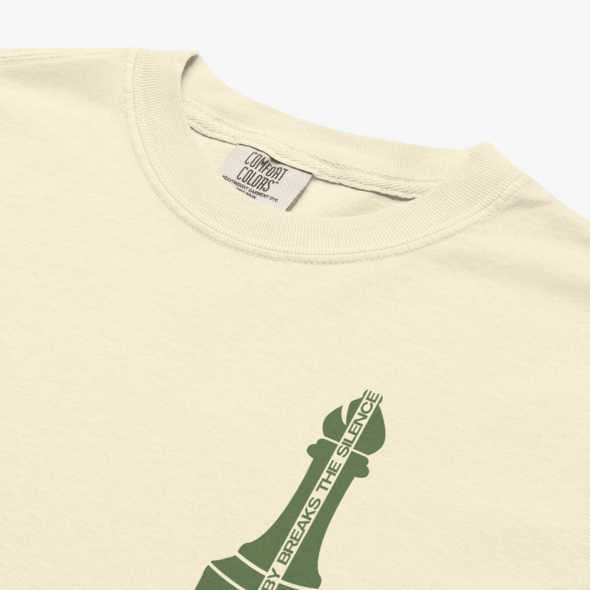 Closeup chest detail view of Bobby Fischer vs Boris Spassky Bobby Breaks the Silence t-shirt, light colorway