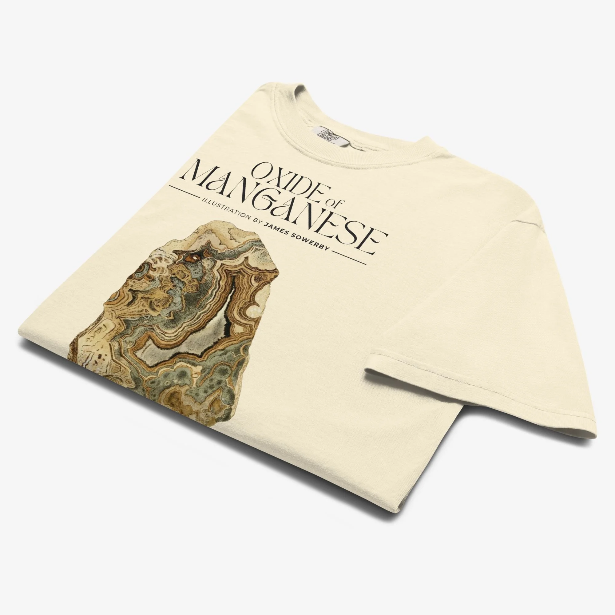 Folded view of Oxide of Magnesium mineralogy tee, ivory colorway