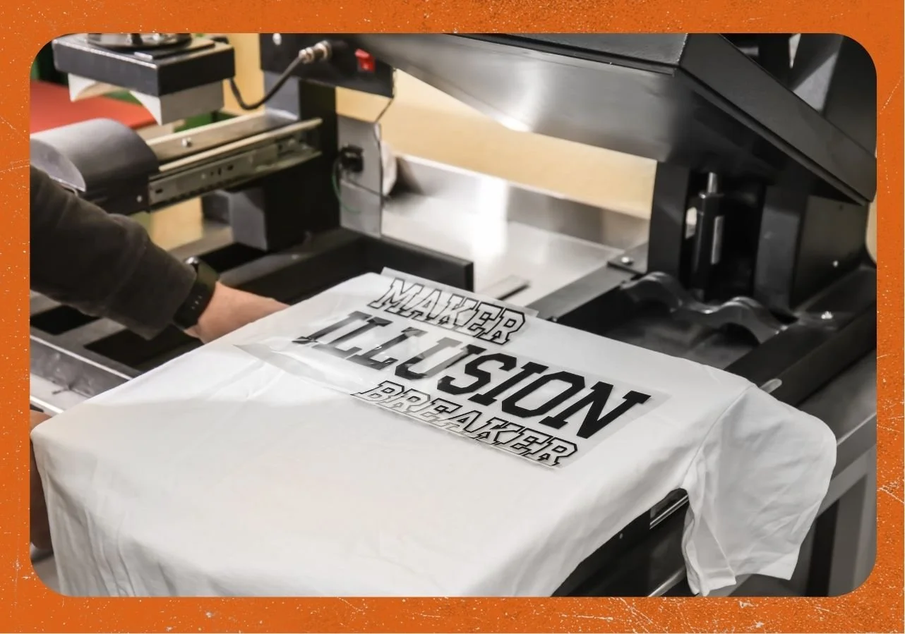 Using Direct-to-Film (DTF) print technique in clothing factory on t-shirt
