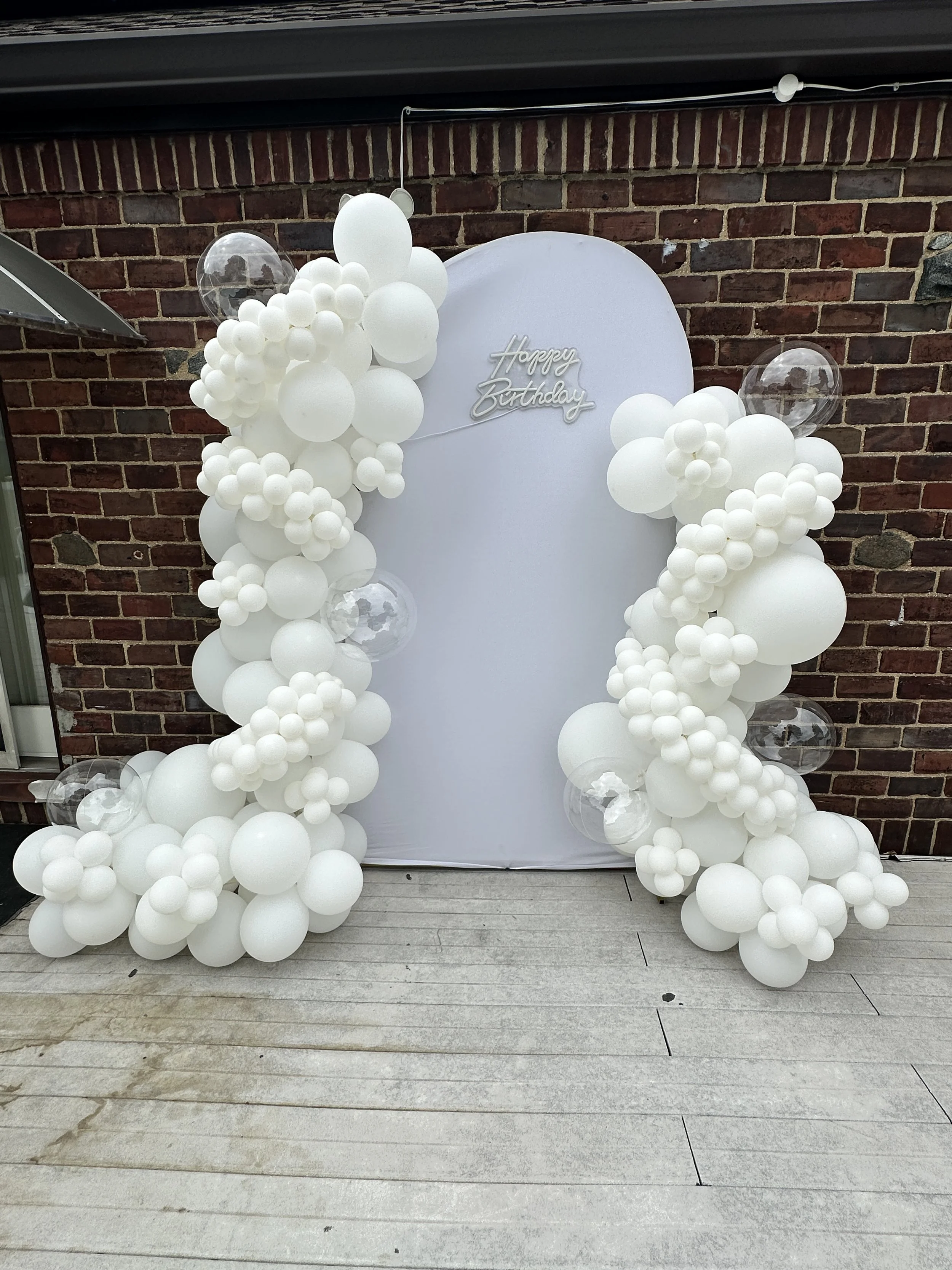 All white party balloons and backdrop