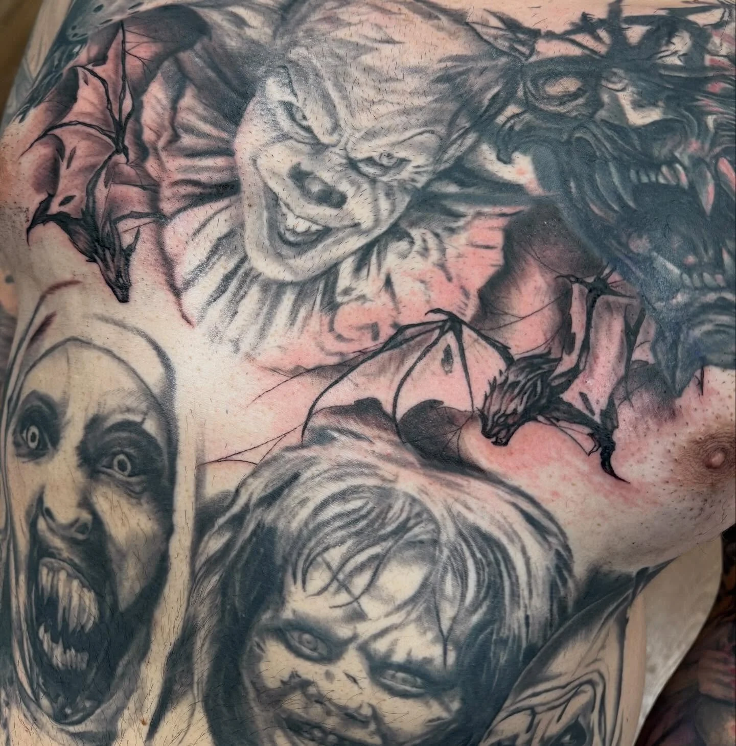 Chipping away on Brandon&lsquo;s horror torso.  #graditudetattoosupplyllc #ttsbodybalm #fiveoneseventattoojeannette #horrortattoos