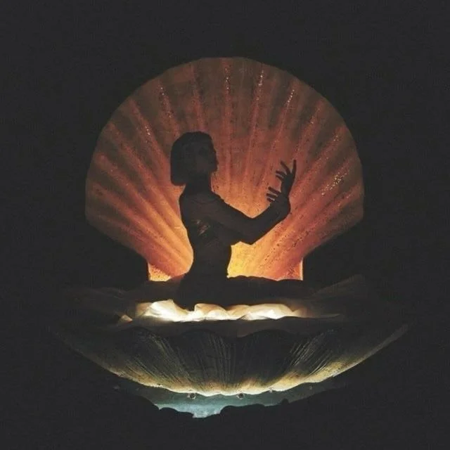 I imagine Selene looking down on us at twilight. The world is enveloped in that lush purplish hue of the evening sky, and She sees us scurrying home on the subway, laughing over dinner with a friend (she&rsquo;s hoping it includes something sensuous 