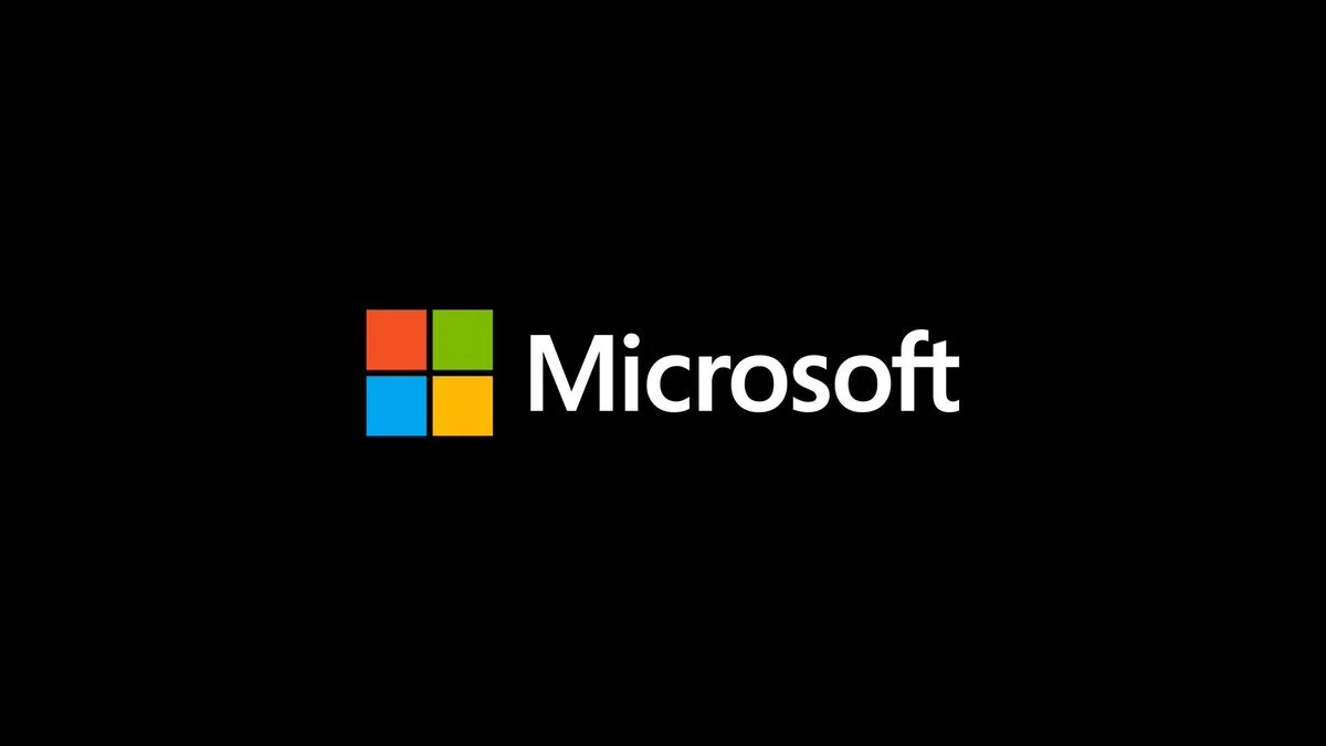 Microsoft logo with four colored squares and the word Microsoft on a black background.