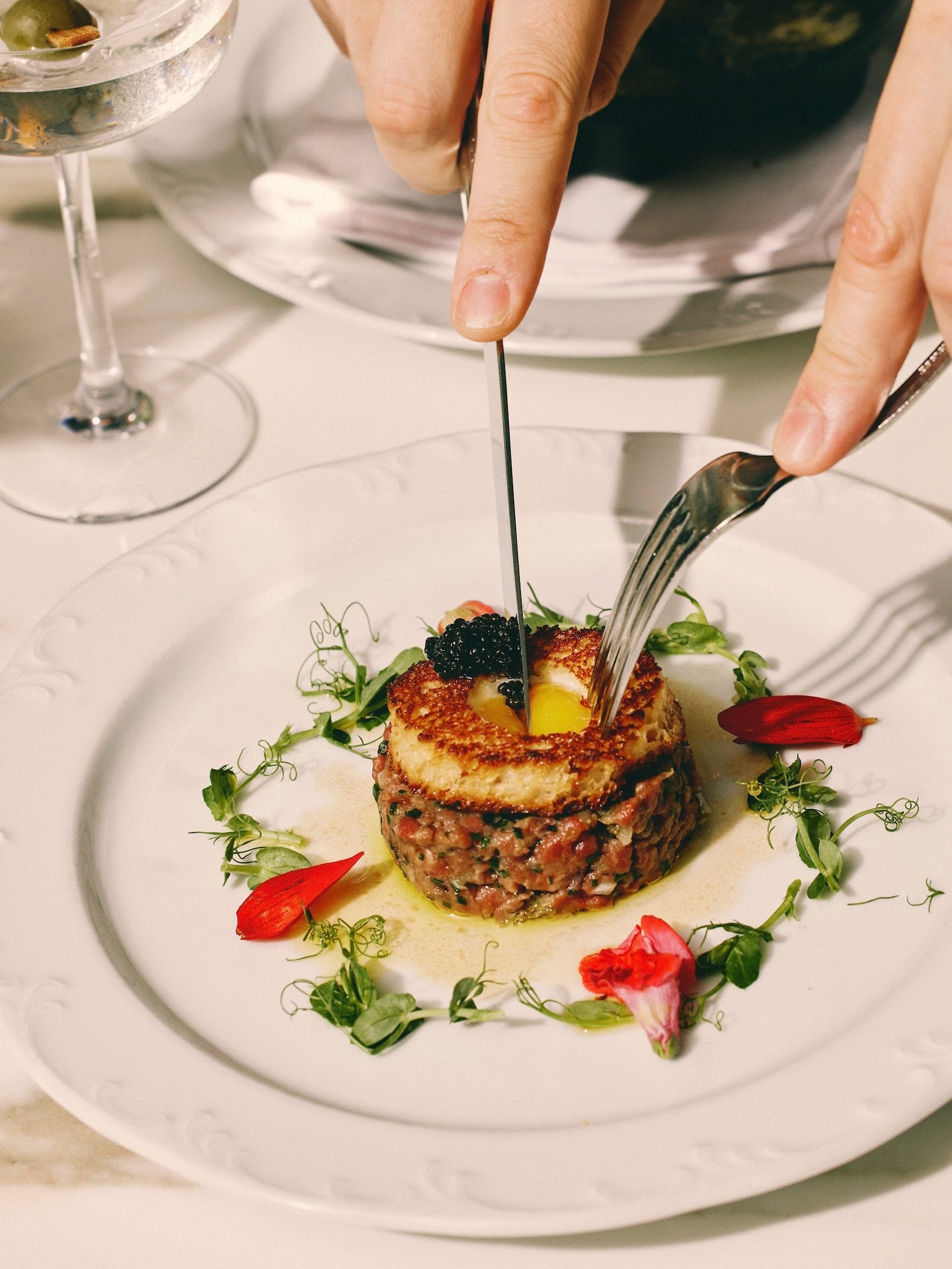 The iconic, the spectacular, the dish that keeps you coming back for more: Steak Tartar by @chefscanga, offered in both our Tavern and Dining Room experiences. 

Our Steak Tartar is perfection in every morsel, crowned with a brioche &amp; quail egg t