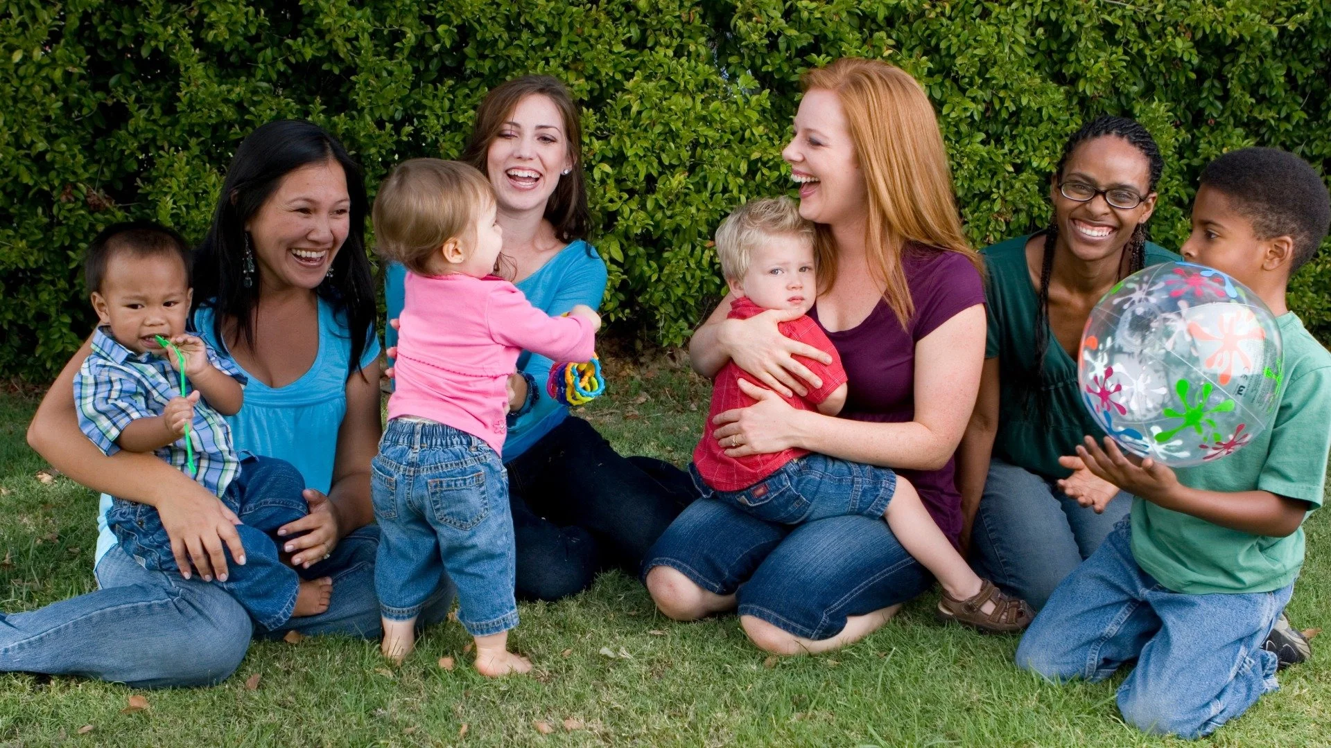 A group of moms and their children having a playdate
