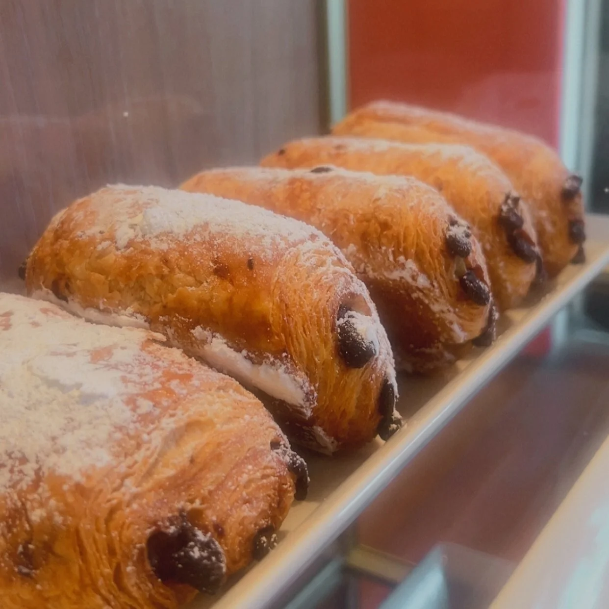 Back in the case today &mdash; Chocolate Croissants ✨ Soft, flaky croissant filled with the perfect amount of chocolate. The sweet &amp; savory play well together making this a treat you will repeat. We&rsquo;re here until 2pm!