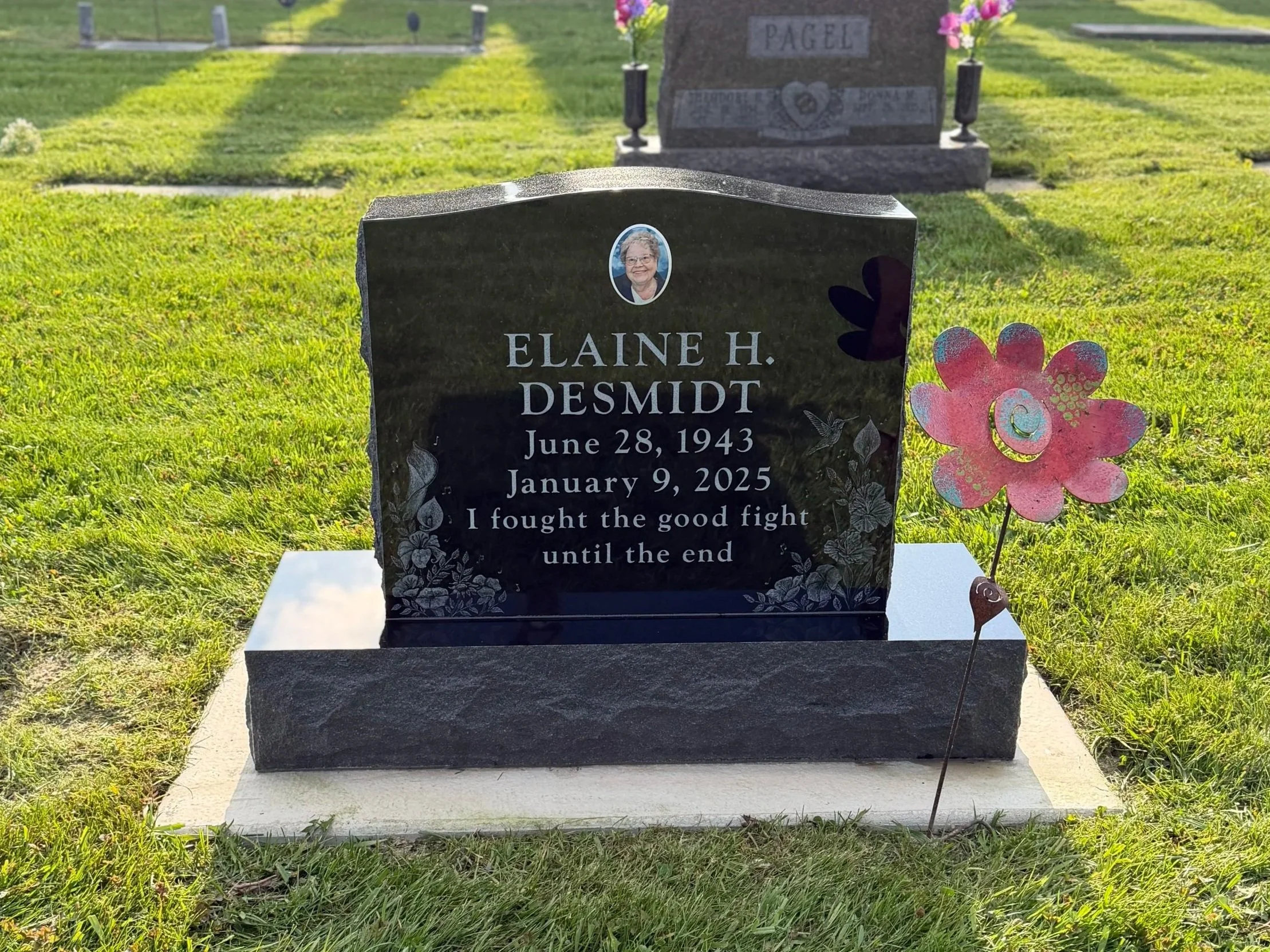 Granite single person upright monument India black with etching. Timeless Tribute Memorials LLC Oshkosh, WI