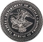 Custom aluminum plaque featuring the Federal Bureau of Prisons seal with detailed eagle artwork and raised-style lettering.