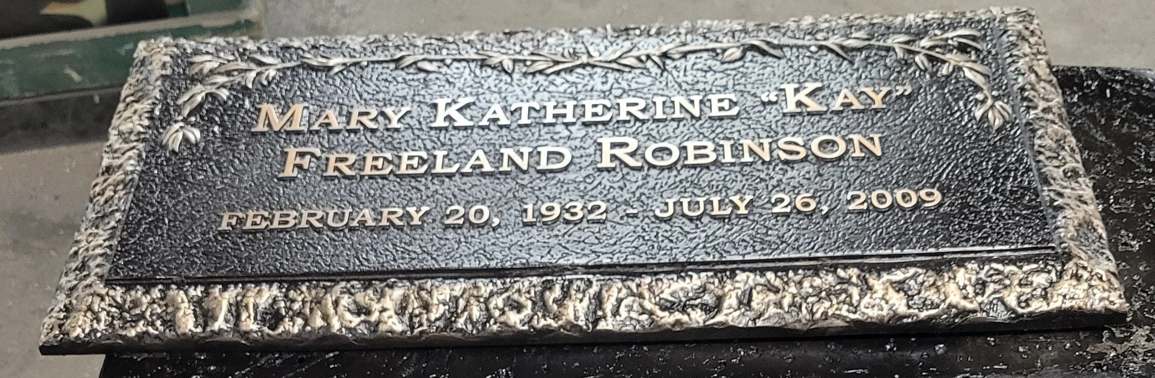 Elegant custom memorial plaques honoring Mary Katherine “Kay” Freeland Robinson with engraved lettering and decorative border, created as a lasting metal memorial plaque.
