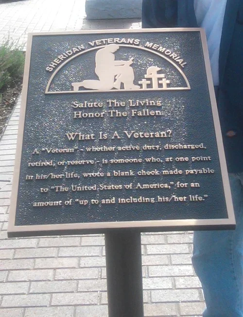Veterans memorial marker created as a custom 3d bas relief plaque with sculpted soldier imagery and inscription common in military bas relief plaques.