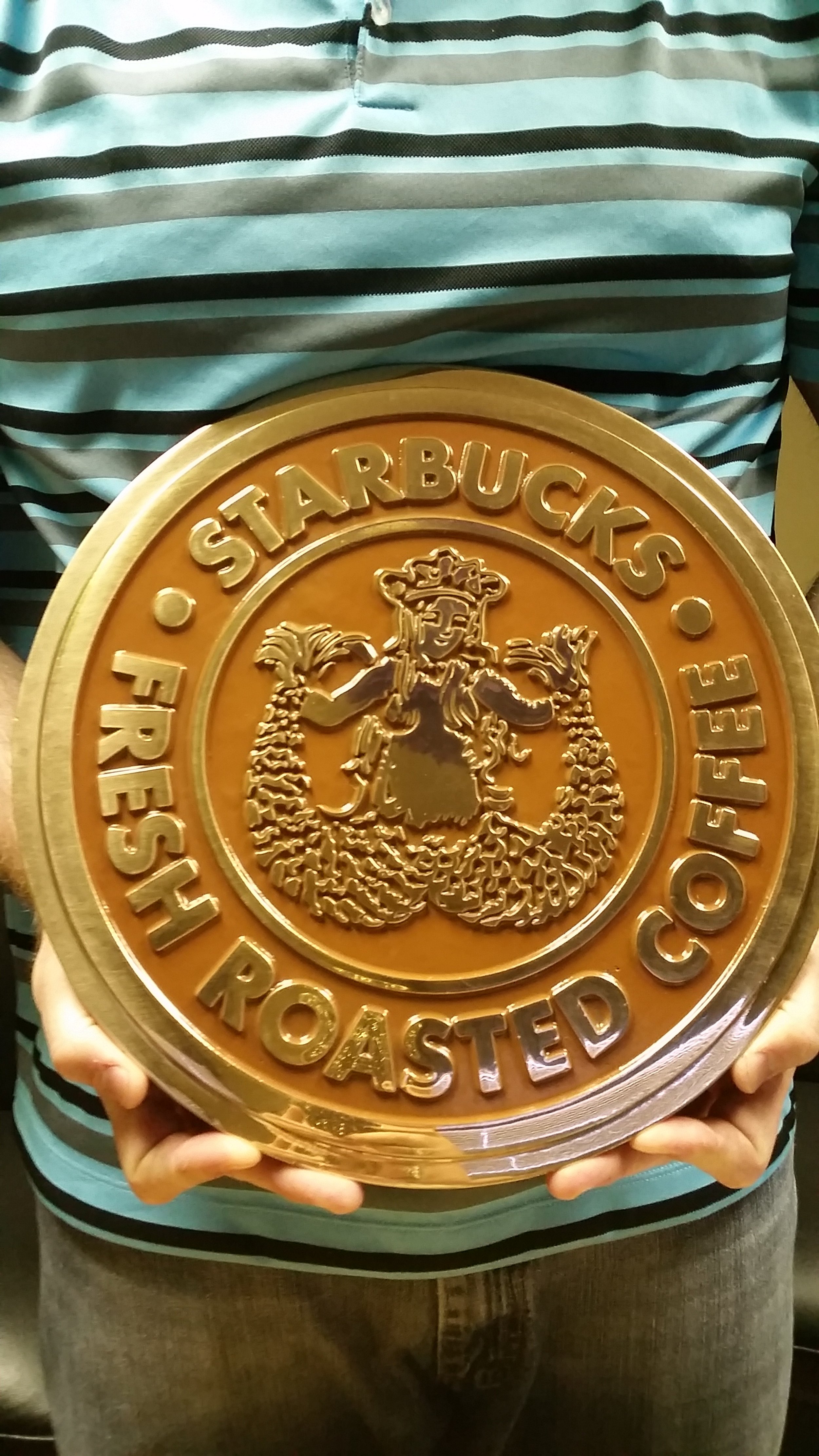 Hand-sculpted coffee brand emblem cast as a 3d bas relief plaque demonstrating dimensional lettering and logo design used in custom bas relief plaques.
