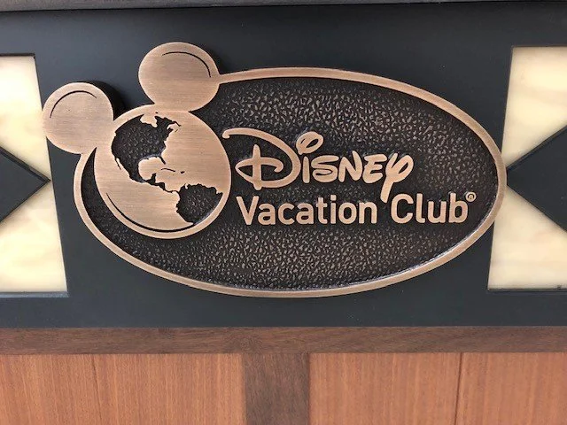 Corporate logo signage created as a dimensional 3d bas relief plaque demonstrating custom branding applications for architectural bas relief plaques.