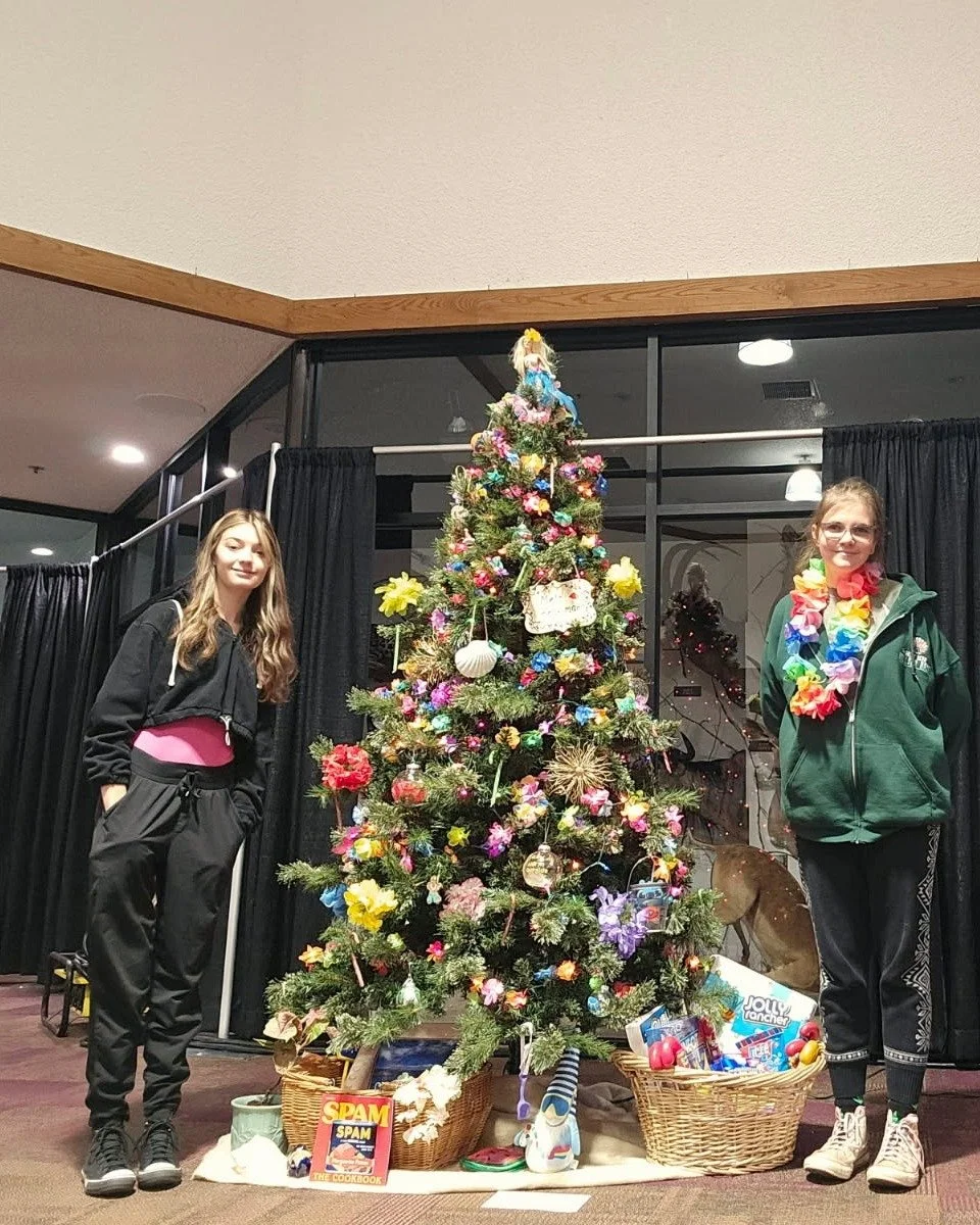 Santa's favorite Elves are in the holiday spirit. Alex and Nya hand crafted every ornament on this tree with love and care. They then spent the morning setting it up for your viewing and bidding pleasure at this year's Festival of Trees - learn more 